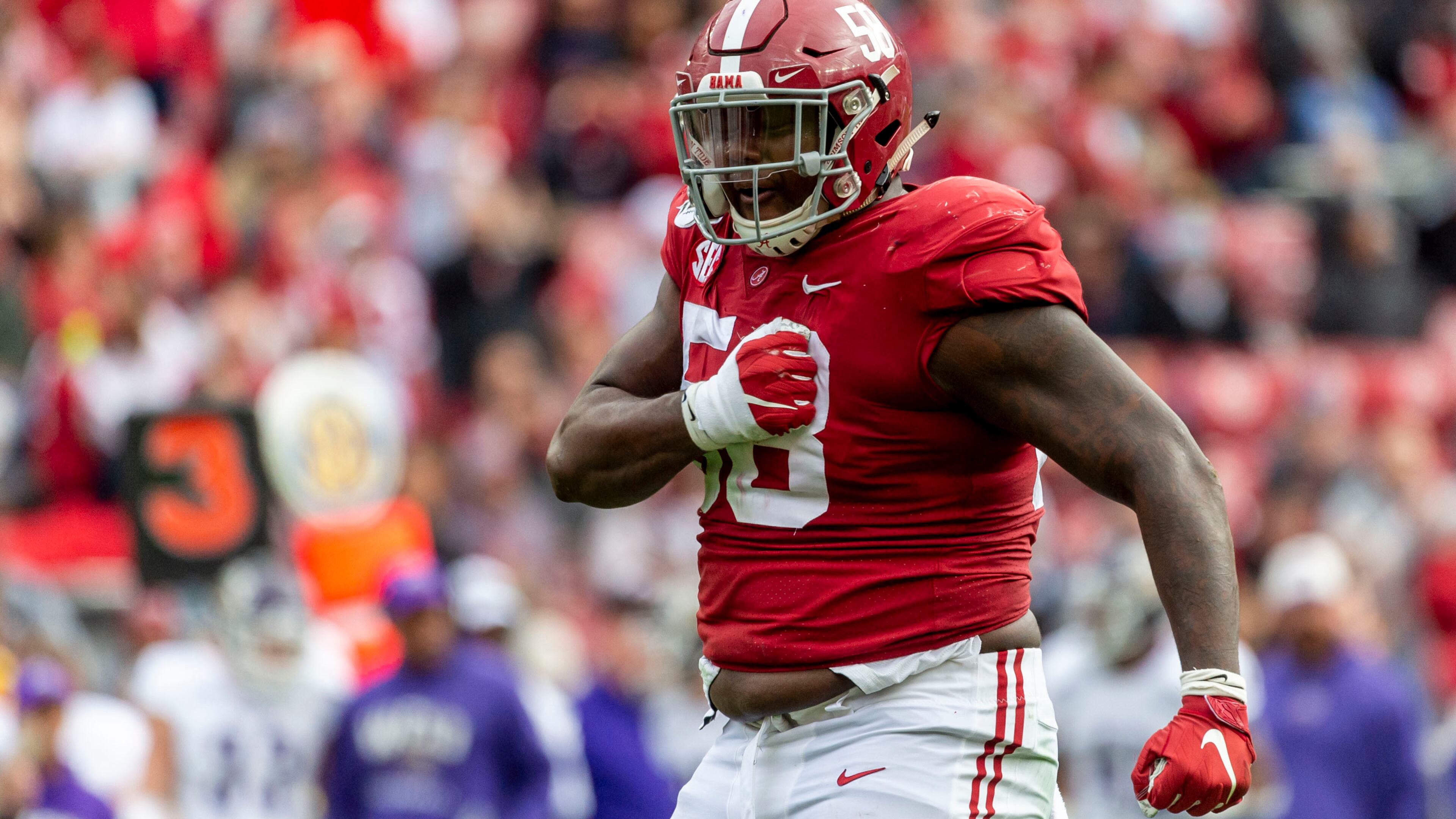 Alabama defensive lineman Christian Barmore (58) celebrates a sack against Western Carolina during the first half Saturday, Nov. 23, 2019, in Tuscaloosa, Ala. (Vasha Hunt/AP)