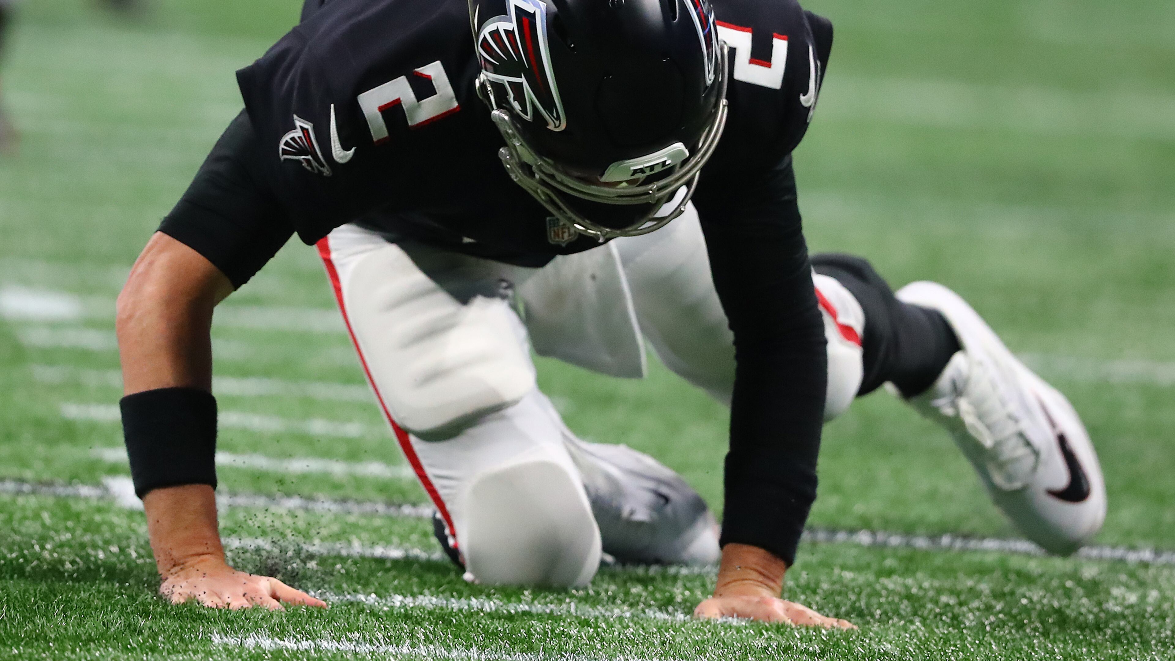 Falcons quarterback Matt Ryan is knocked to the turf by the Buccaneers during the second half during a 30-17 loss in a NFL football game on Sunday, Dec 5, 2021, in Atlanta. “Curtis Compton / Curtis.Compton@ajc.com”`