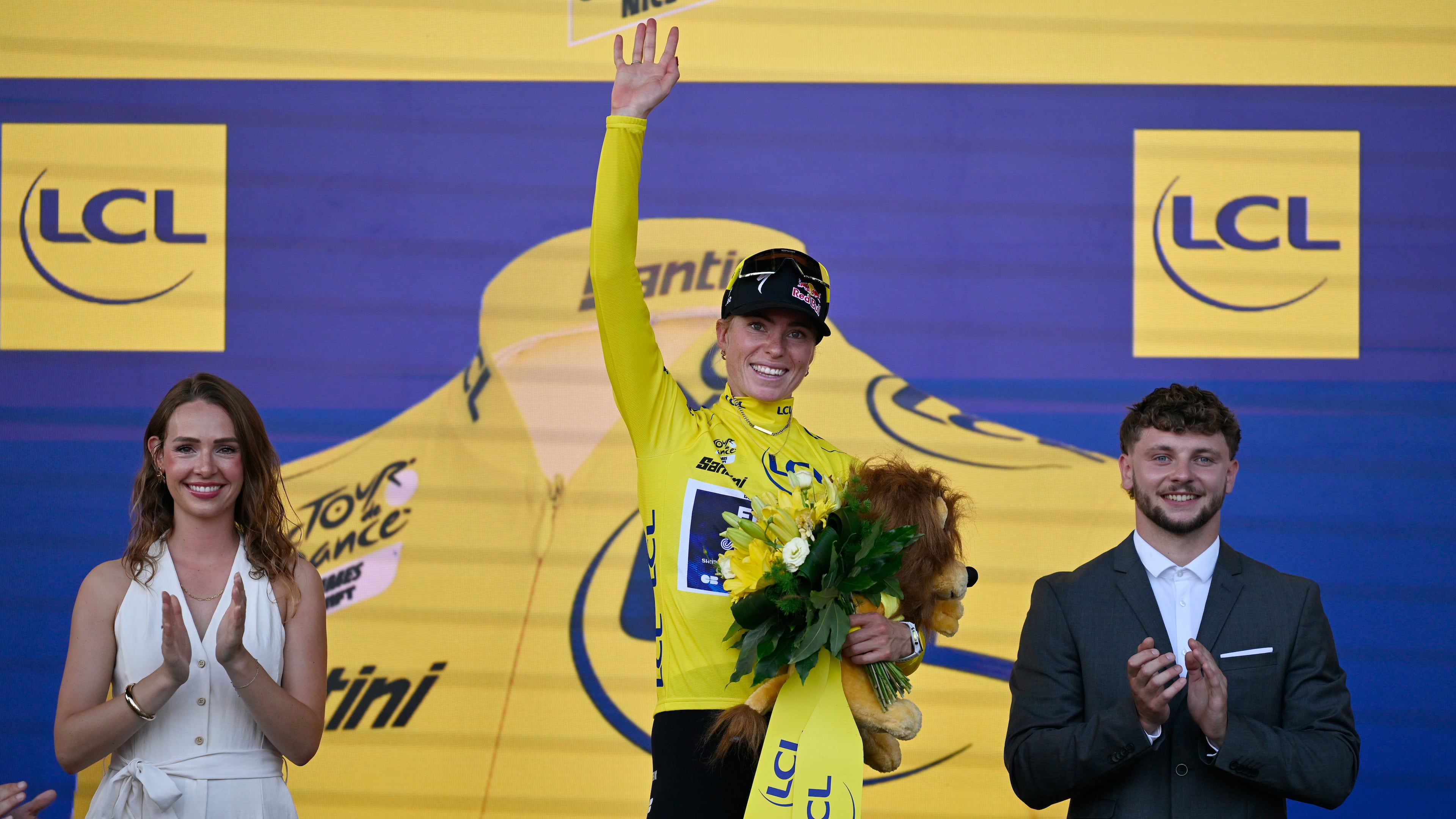 Netherlands' Demi Vollering celebrates on the podium after winning the Women's Tour de France cycling race (Tour de France Femmes) in Nice, France, Sunday, Aug. 9, 2026. (AP Photo/Philippe Magoni)