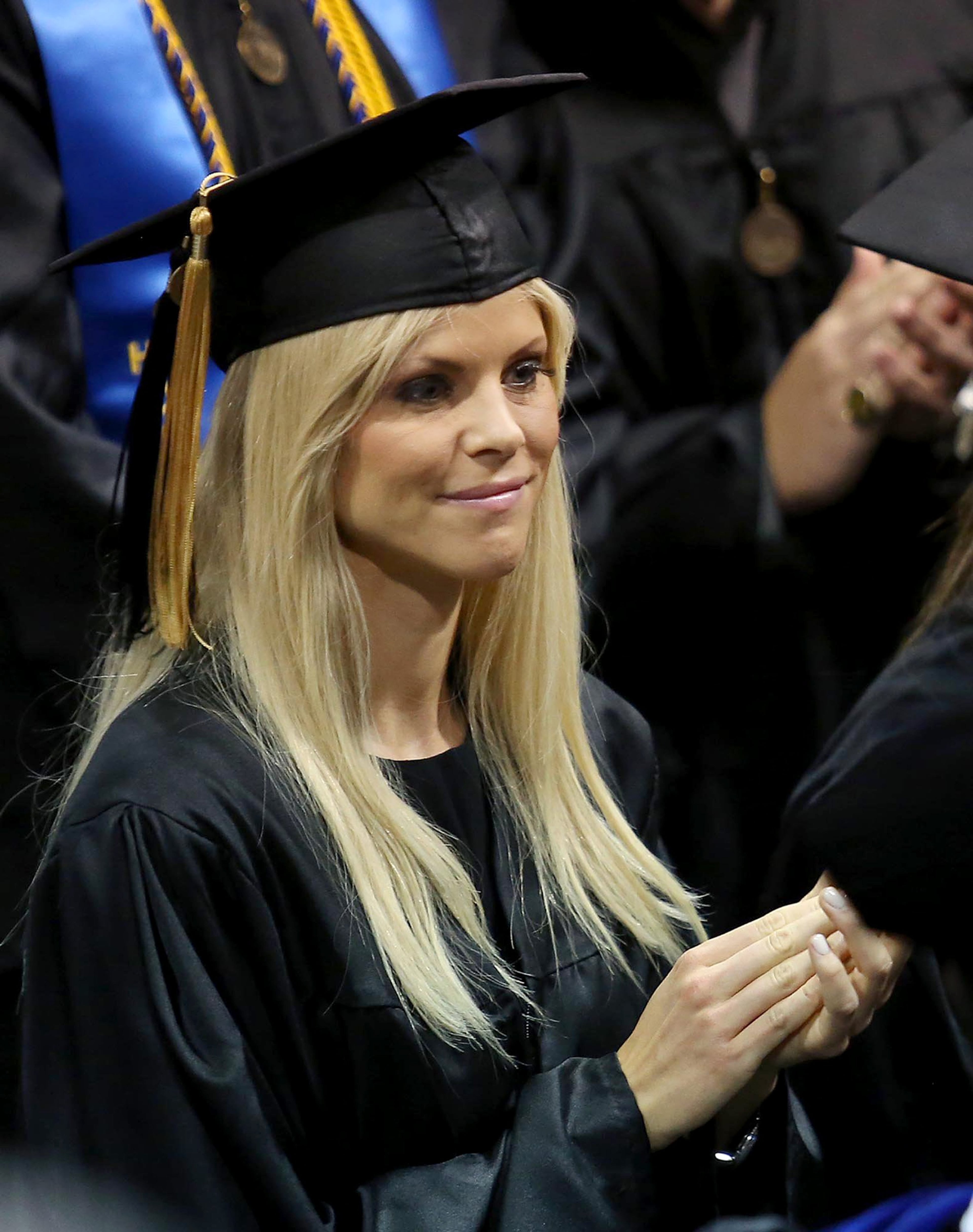 Elin Nordegren claps during commencement ceremonies at Rollins College in Winter Park, Fla., Saturday, May 10, 2014. Nordegren, the former wife of golfer Tiger Woods, was named the "Outstanding Graduating Senior" for Rollins College. (Stephen M. Dowell/Orlando Sentinel/MCT)