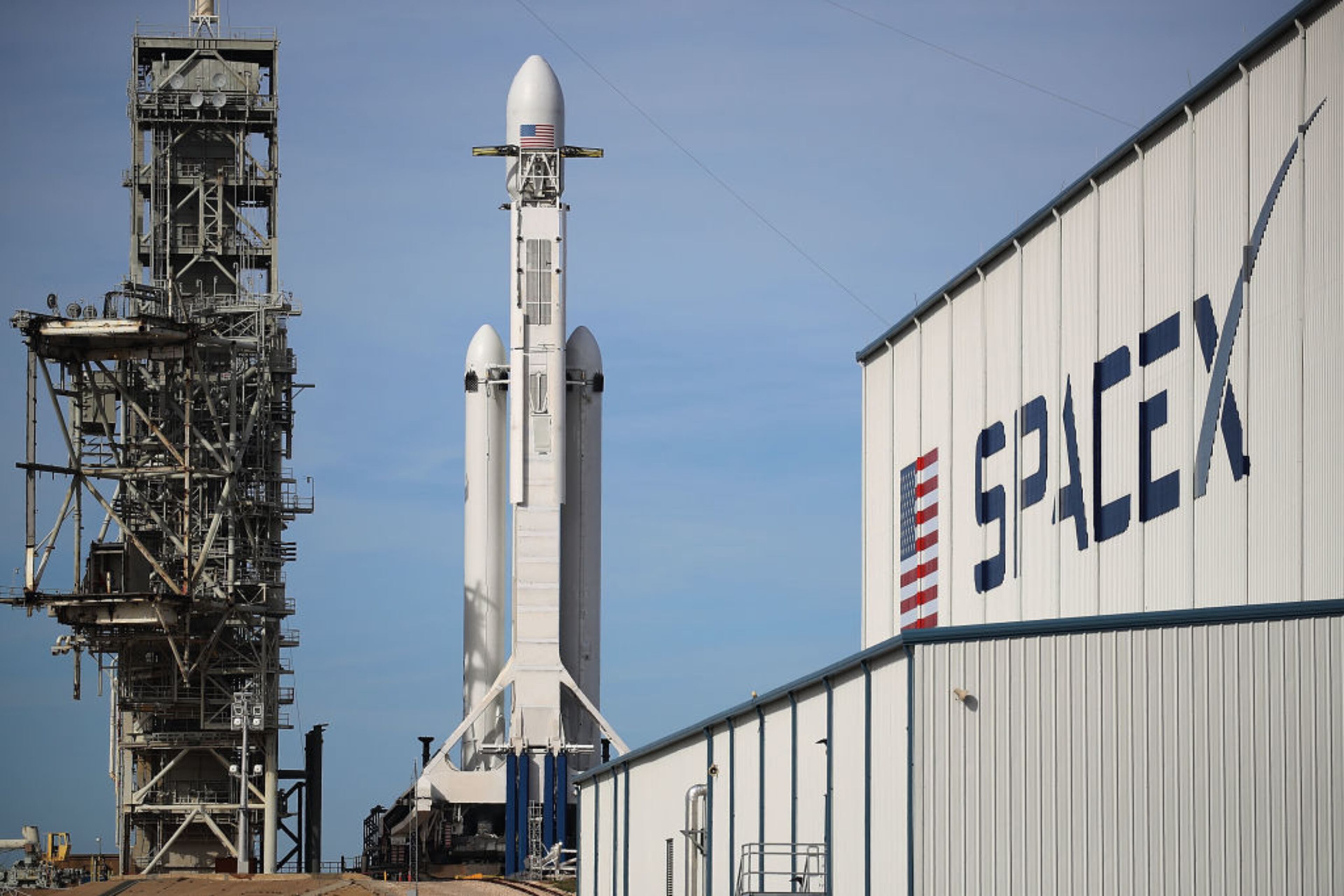 CAPE CANAVERAL, FL - FEBRUARY 05: The SpaceX Falcon Heavy rocket sits on launch pad 39A at Kennedy Space Center as it is prepared for tomorrow's lift-off on February 5, 2018 in Cape Canaveral, Florida. The rocket, which is the most powerful rocket in the world, is scheduled to make its maiden flight between 1:30 and 4:30 p.m. tomorrow. (Photo by Joe Raedle/Getty Images)
