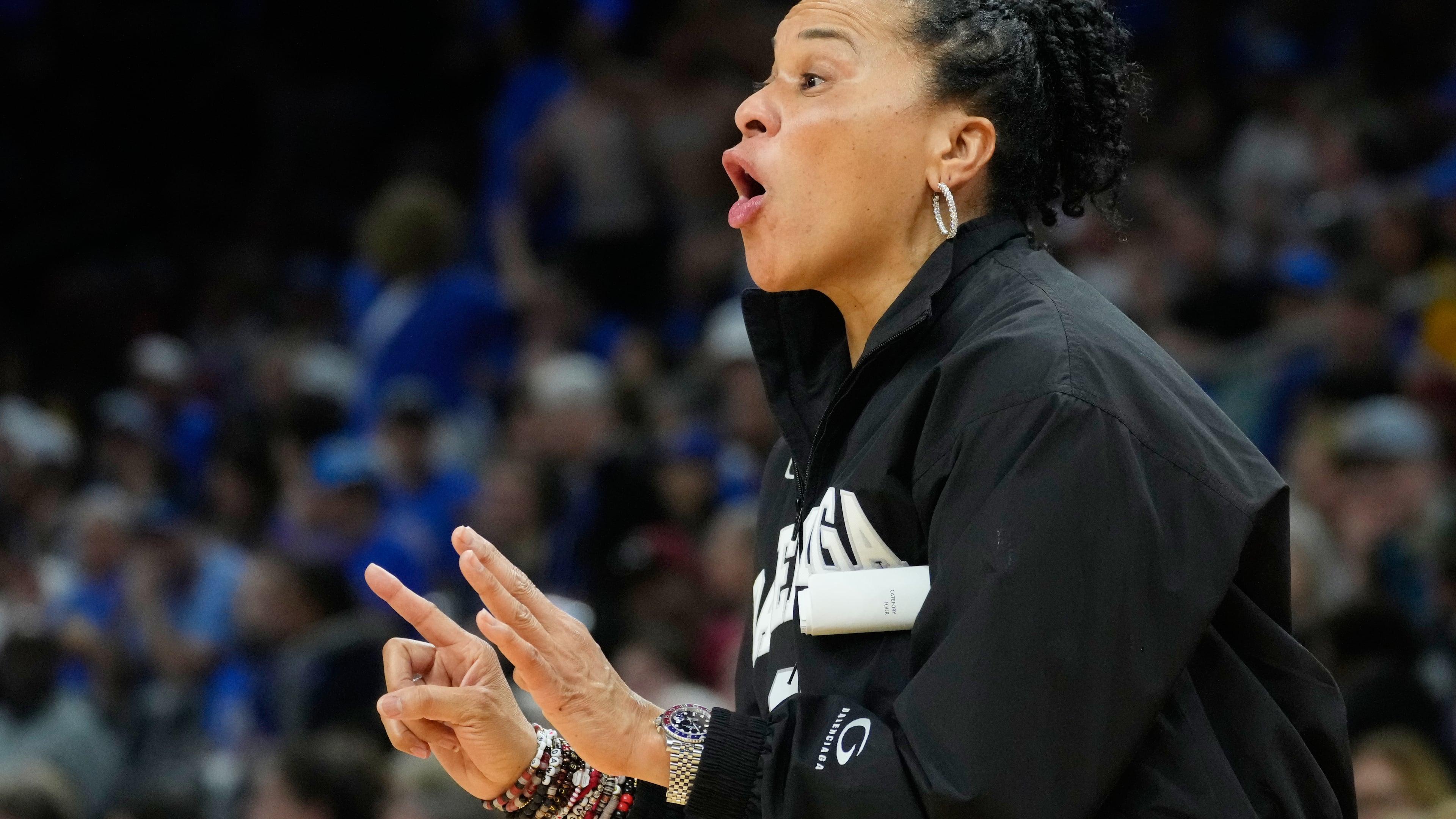 FILE - South Carolina head coach Dawn Staley motions towards the court against UCLA during the second half of the women's National Championship Final Four NCAA college basketball tournament game, April 5, 2026, in Phoenix. (AP Photo/Ross D. Franklin, File)