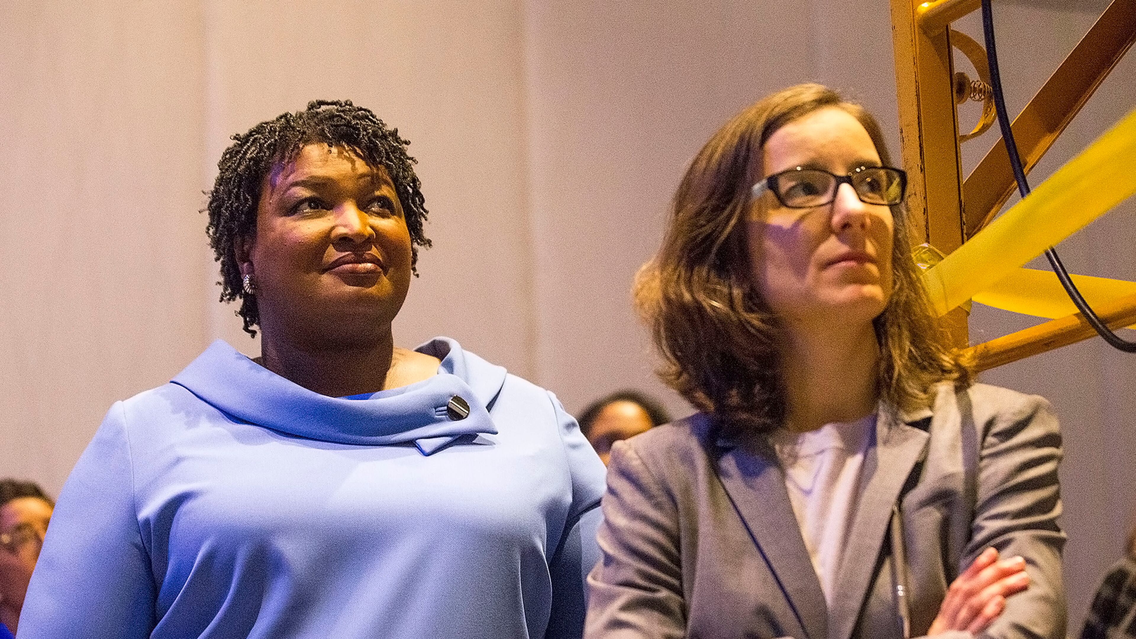 Democrat Stacey Abrams, left, set a fundraising record in her unsuccessful bid for governor, raising $113 million for a rematch she ultimately lost to Gov. Brian Kemp, according to filings Monday. But Abrams ran into financial problems by the end of the campaign, with her leadership committee listing about $1.4 million in debt. In the final two weeks of the race, a pivotal moment when the early voting period was ramping up, she cut her TV ad buy to less than $1 million. Her campaign manager, Lauren Groh-Wargo, right, originally framed the cutback as a way to shift resources toward digital outreach and on-the-ground canvassing. But Groh-Wargo eventually acknowledged the decision was designed to contain expenses. (AJC FILE)