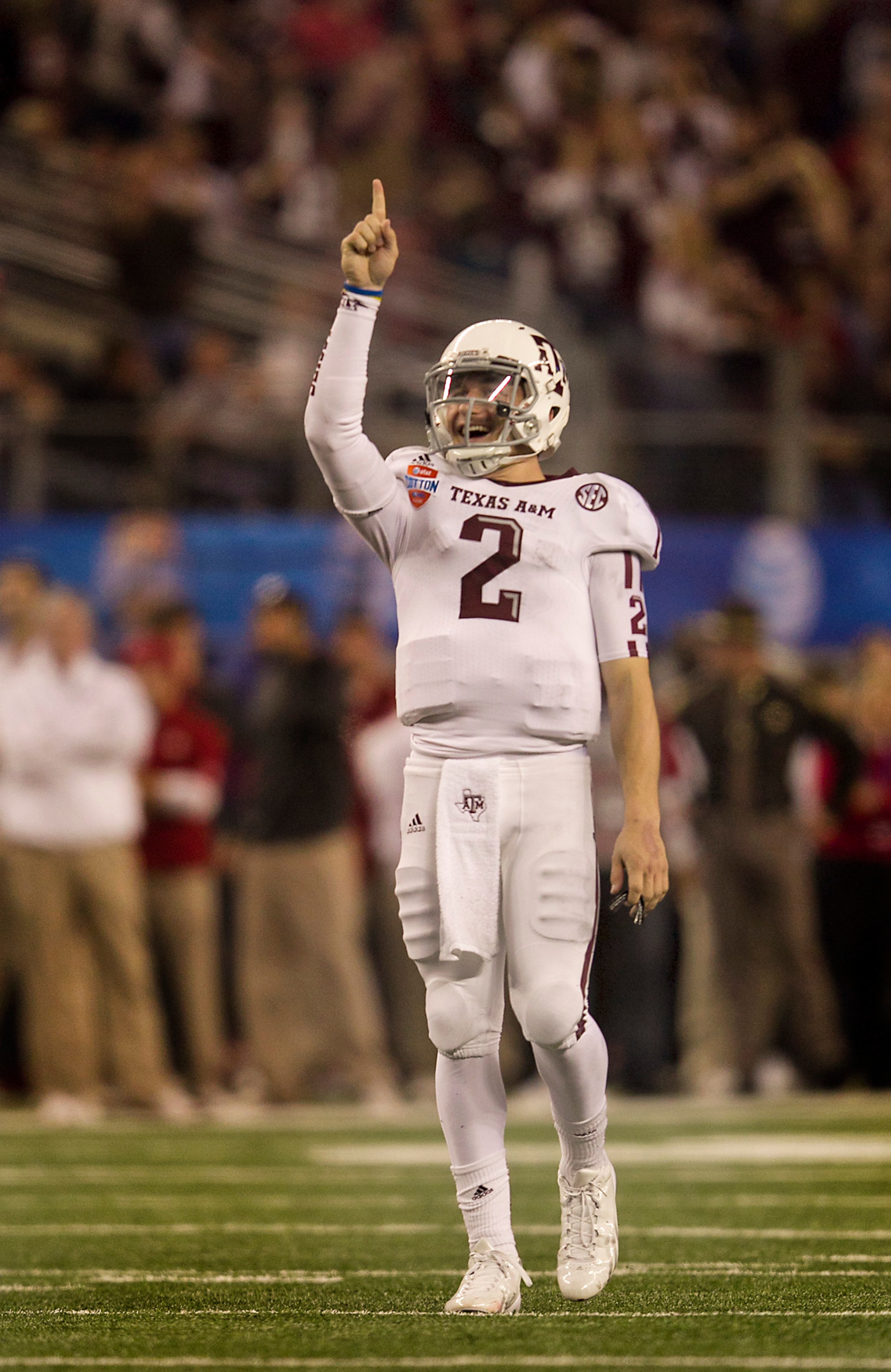 Texas A&M's Johnny Manziel (2) celebrates after a 33-yard touchdown pass to Ryan Swope against Oklahoma in the second half of the 77th AT&T Cotton Bowl Classic held at the Cowboy Stadium in Arlington, Texas, on Friday, January 4, 2013. Texas A&M defeated Oklahoma 41-13. Rodolfo Gonzalez / Austin American-Statesman