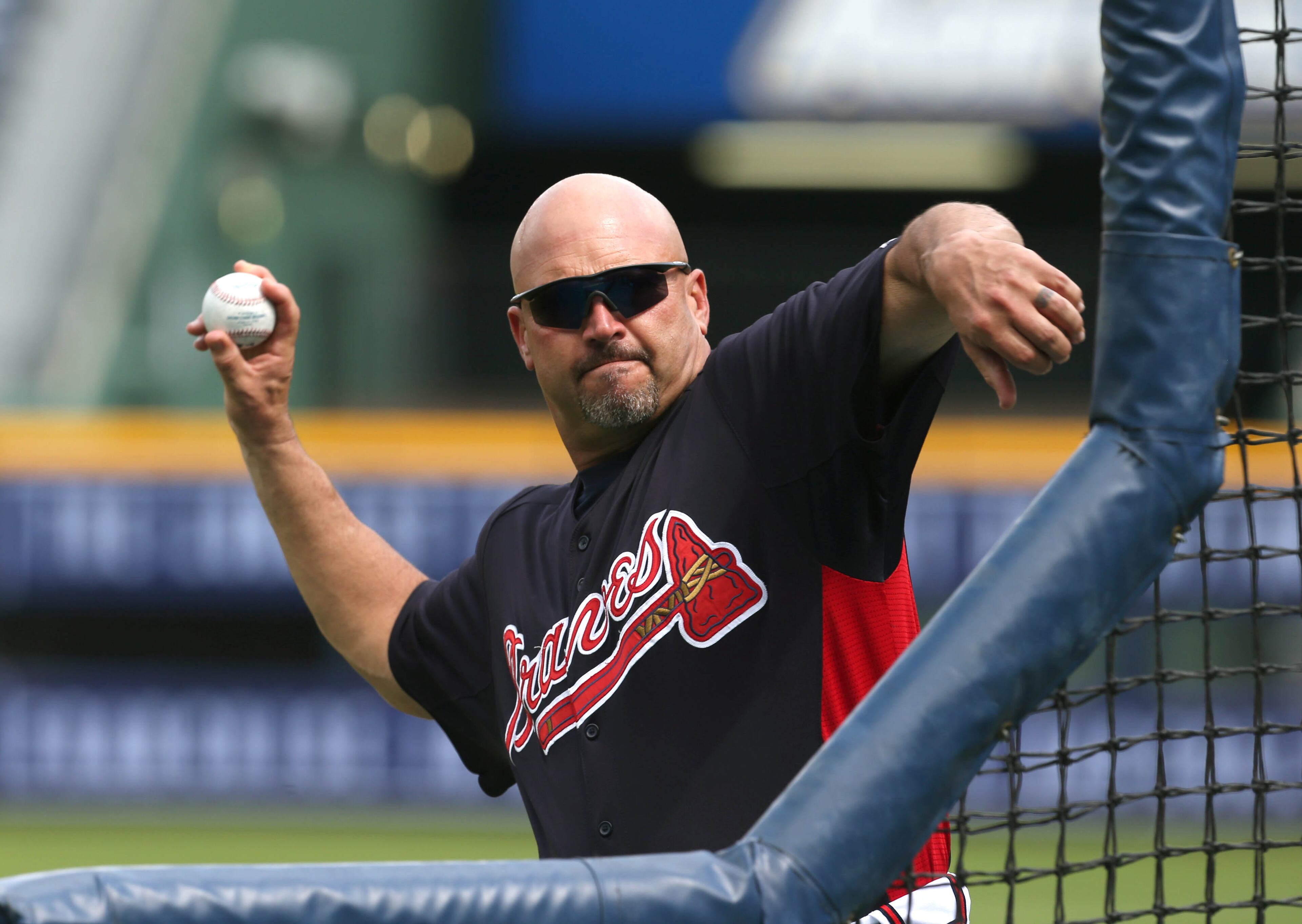 Atlanta Braves manager Fredi Gonzalez throws to a batter during batting practice in preparation for their NL Division Series against the Los Angeles Dodgers at Turner Field in Atlanta, Ga., October 2, 2013. The Atlanta Braves host the Los Angeles Dodgers in game 1 of the NL Division Series Thursday October 3, 2013 at 8:37pm.