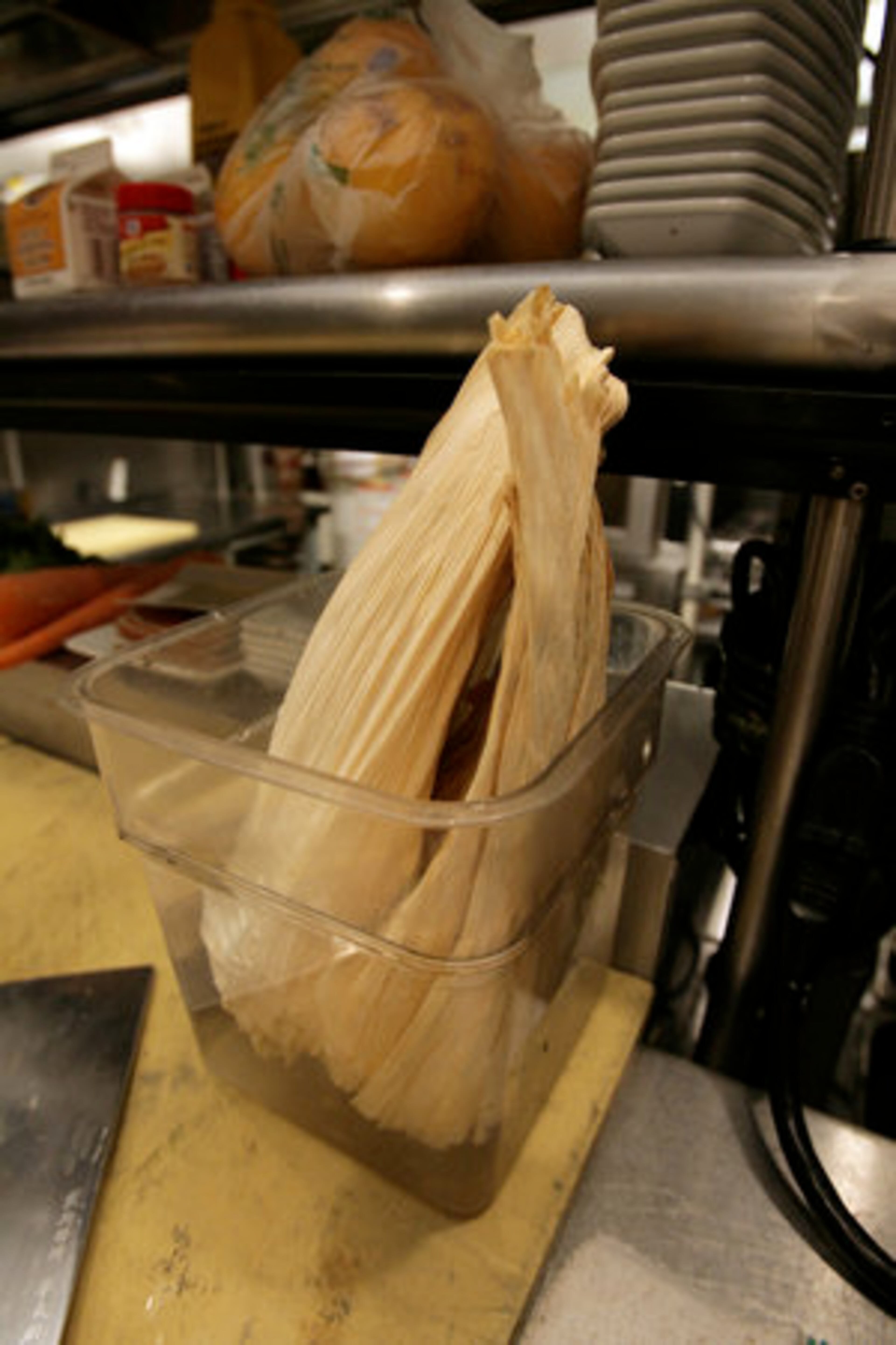 Prep work includes soaking corn husks, dicing and blanching squash, chopping cilantro and jalapenos, trimming greens and steaming sweet potatoes. 10:58:14 AM