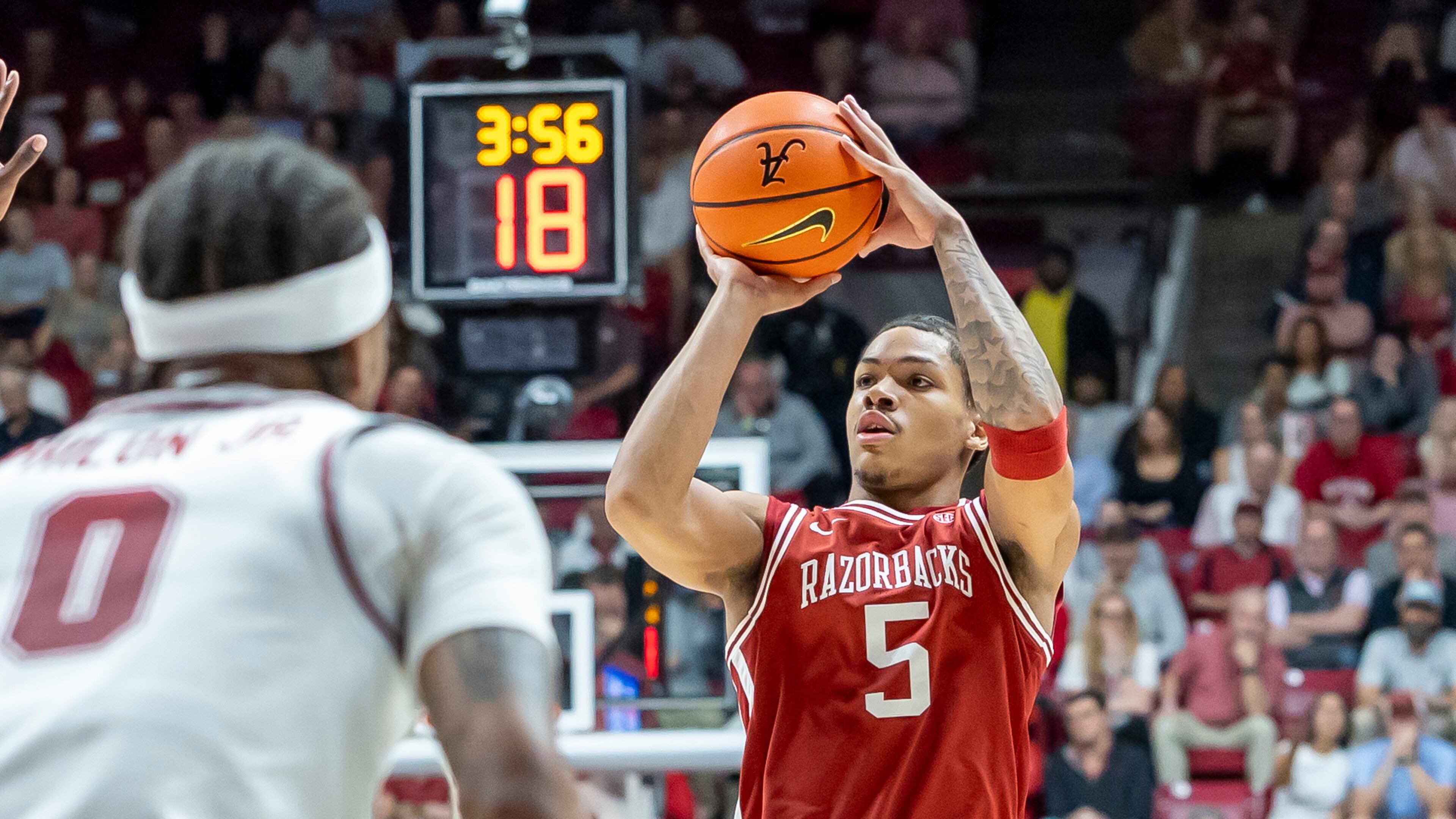 Arkansas guard Darius Acuff Jr. (5) shoots during the first half of an NCAA college basketball game against Alabama Wednesday, Feb. 18, 2026, in Tuscaloosa, Ala. (AP Photo/Vasha Hunt)