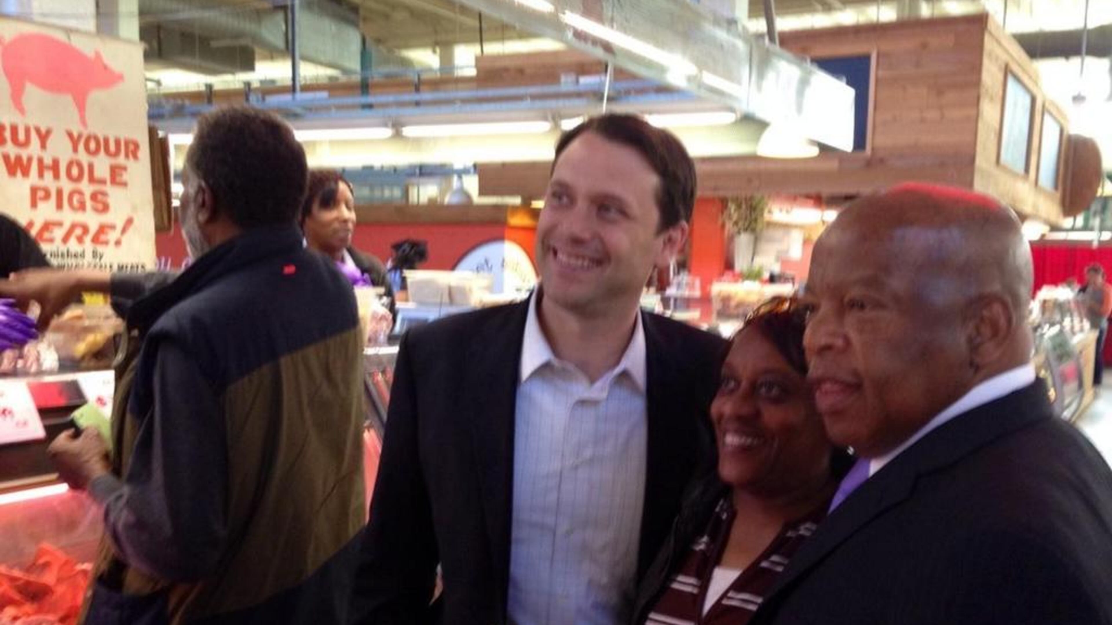 Democratic gubernatorial candidate Jason Carter campaigns with U.S. Rep. John Lewis in 2014. AJC file