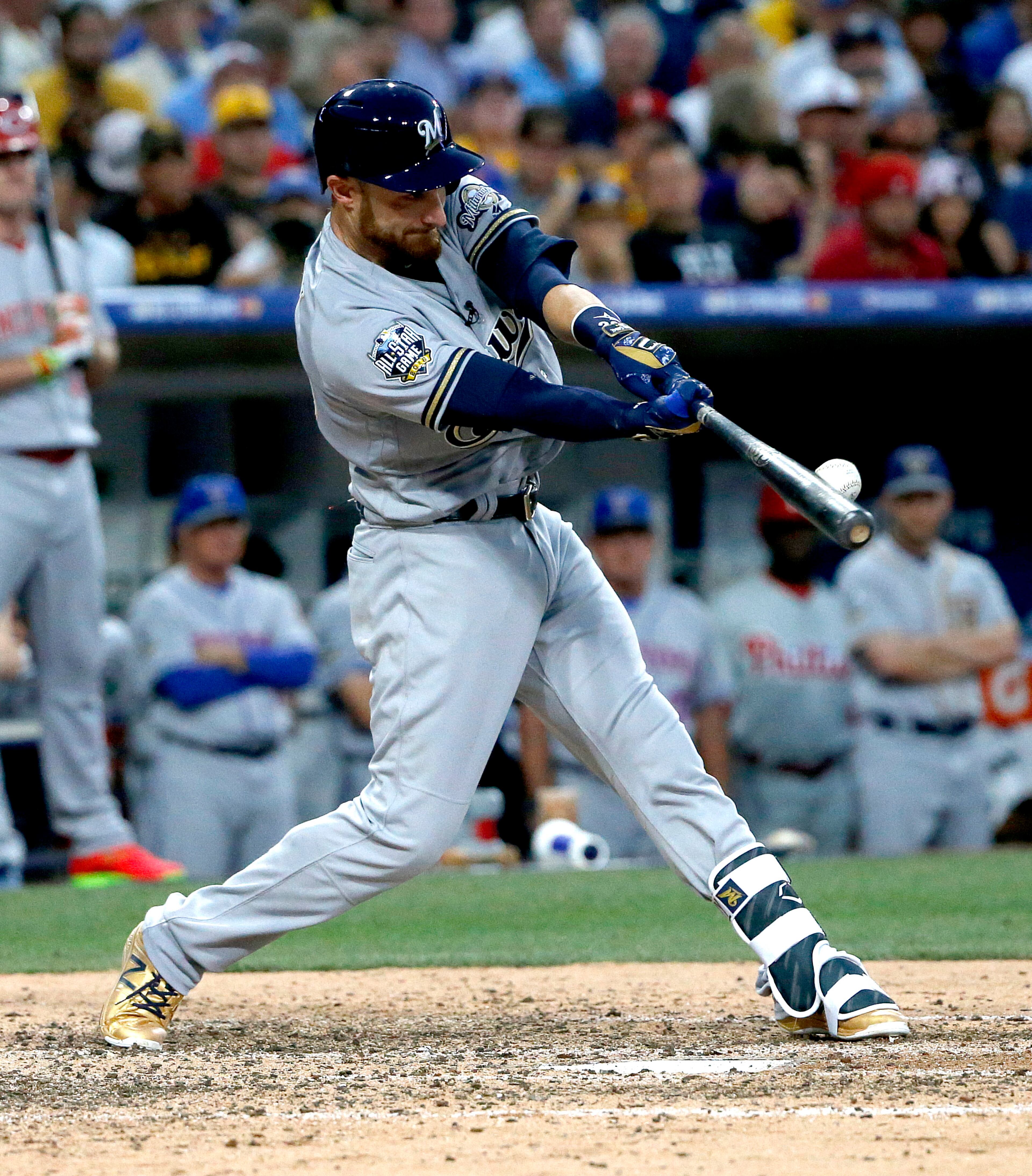 National League's Jonathan Lucroy, of the Milwaukee Brewers, hits during the MLB baseball All-Star Game, Tuesday, July 12, 2016, in San Diego. (AP Photo/Lenny Ignelzi)