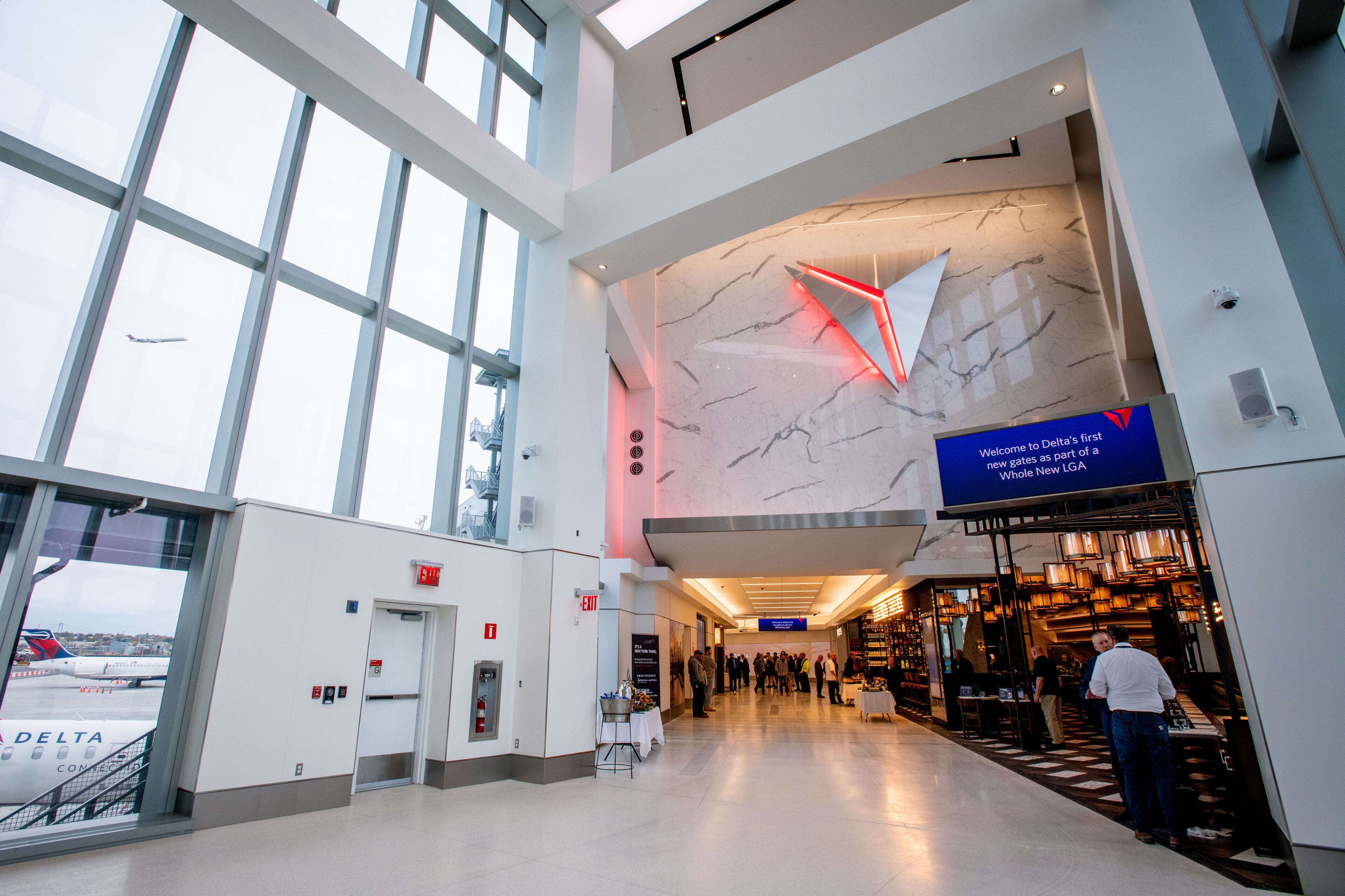 The $8 billion project to revamp LaGuardia Airport broke ground in 2016. In November 2019, Delta opened its first new concourse with seven gates, pictured here in October 2019. (Chris Rank for Rank Studios. Source: Delta)