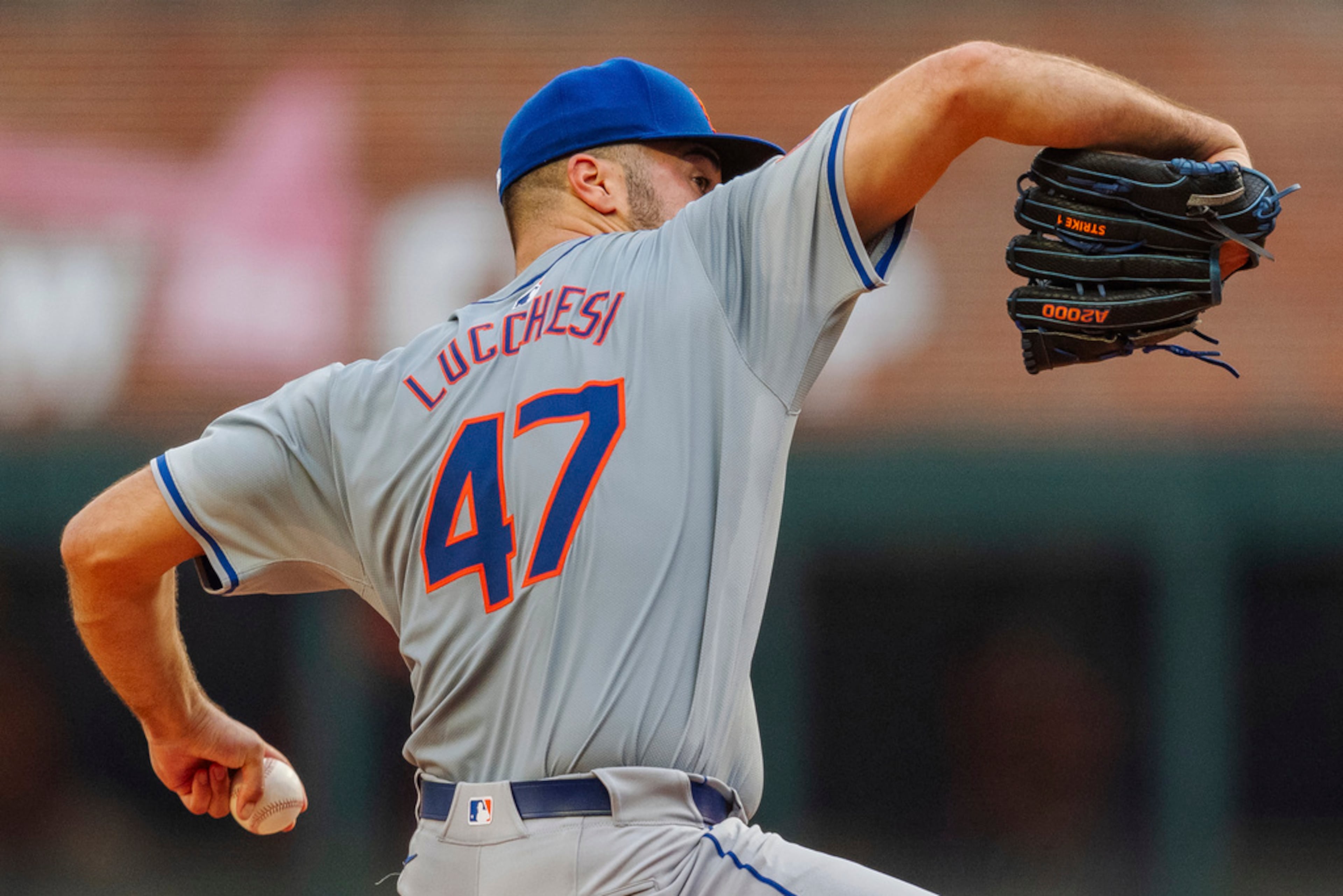 New York Mets pitcher Joey Lucchesi throws in the fifth inning of the second baseball game of a doubleheader against the Atlanta Braves, Monday, Sept. 30, 2024, in Atlanta. (AP Photo/Jason Allen)