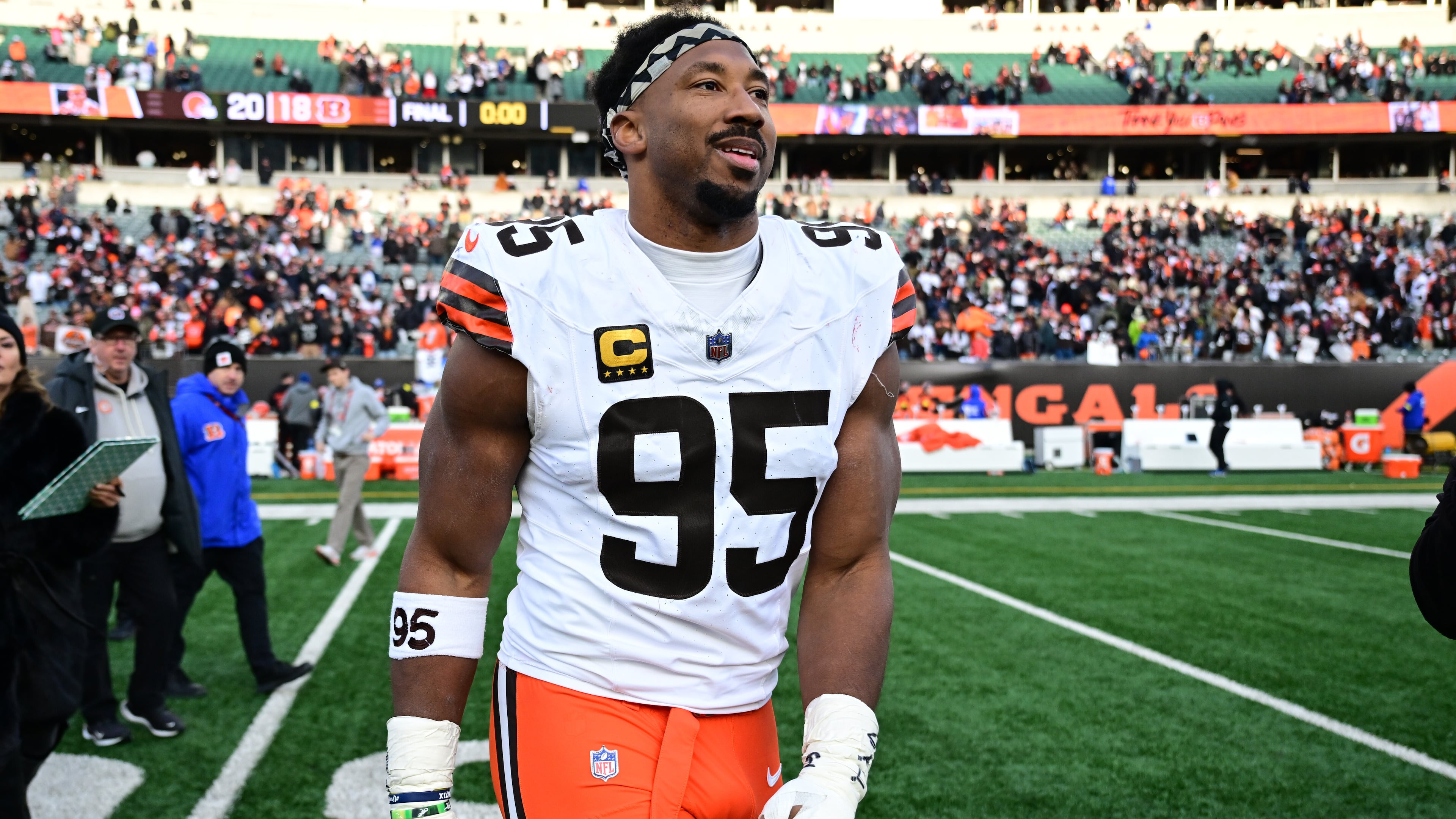 FILE - Cleveland Browns defensive end Myles Garrett celebrates with fans after an NFL football game against the Cincinnati Bengals in Cincinnati, Jan. 4, 2026. (AP Photo/David Dermer, File)