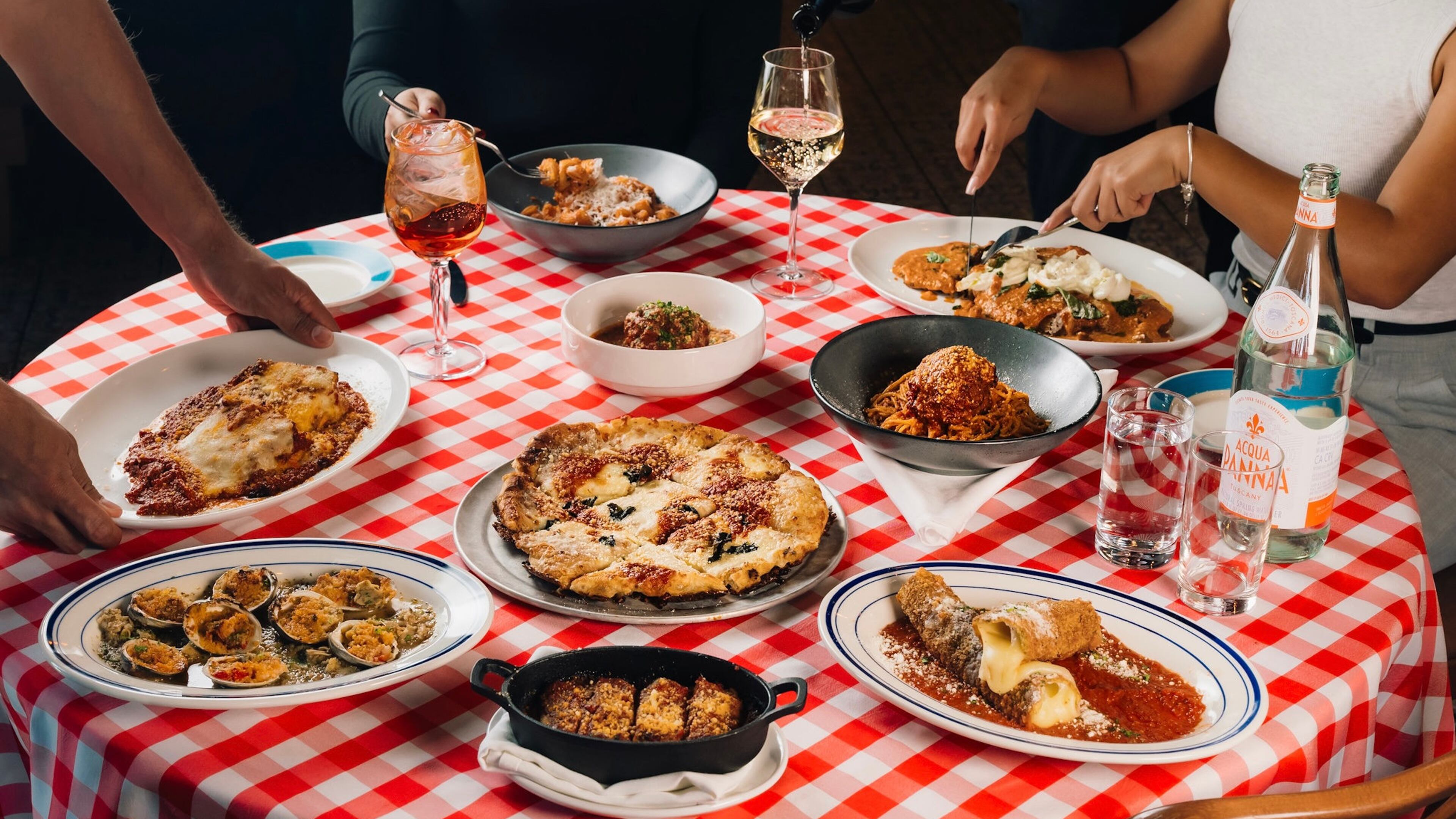 Rosso leans into a nostalgic Italian American atmosphere with its menu and red checkered tablecloths. (Courtesy of Rosso)