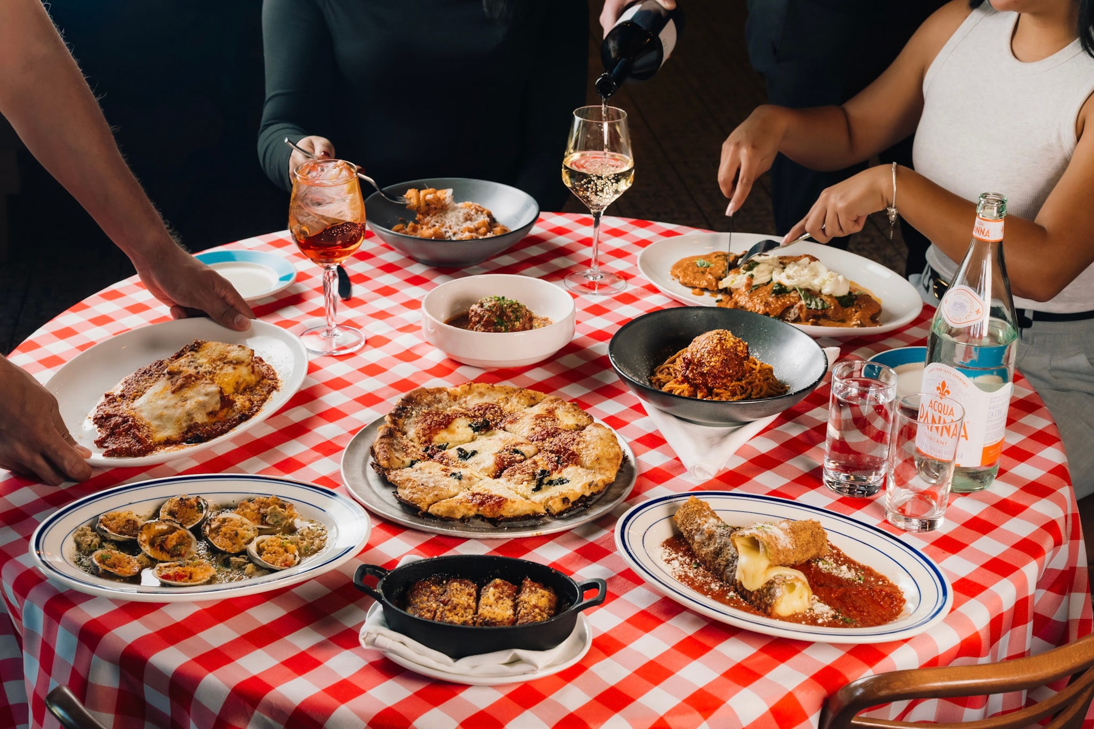 Rosso leans into a nostalgic Italian American atmosphere with its menu and red checkered tablecloths. (Courtesy of Rosso)