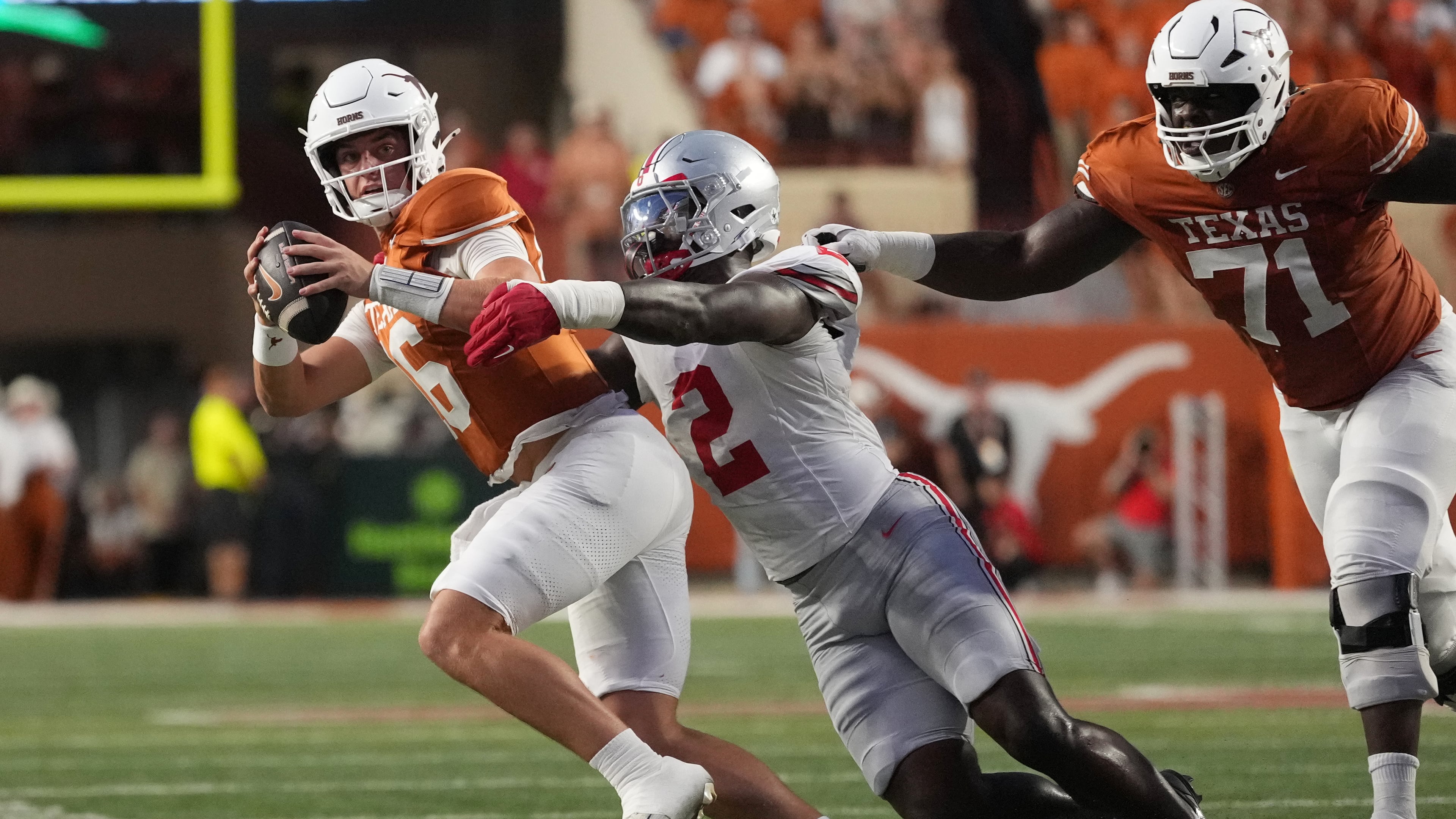 Texas quarterback Arch Manning (16) is sacked for a loss by Ohio State defensive end Kenyatta Jackson Jr. (2) during the first half of an NCAA college football game in Austin, Texas, Saturday, Sept. 12, 2026. (AP Photo/Eric Gay)