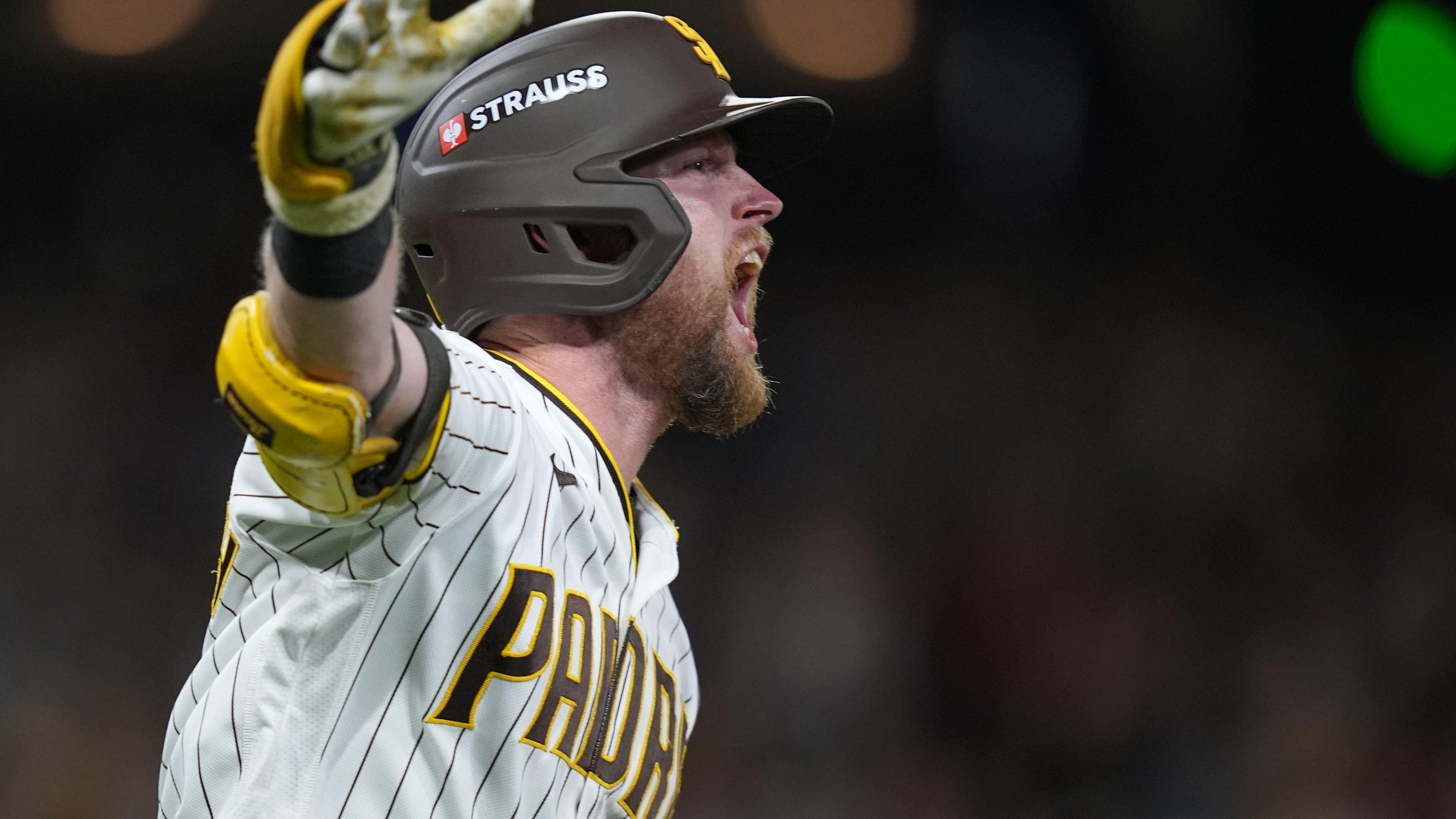 San Diego Padres' Jake Cronenworth celebrates after hitting a solo home run during the fifth inning in Game 3 of baseball's National League Division Series against the Milwaukee Brewers Tuesday, Oct. 6, 2026, in San Diego. (AP Photo/Gregory Bull)