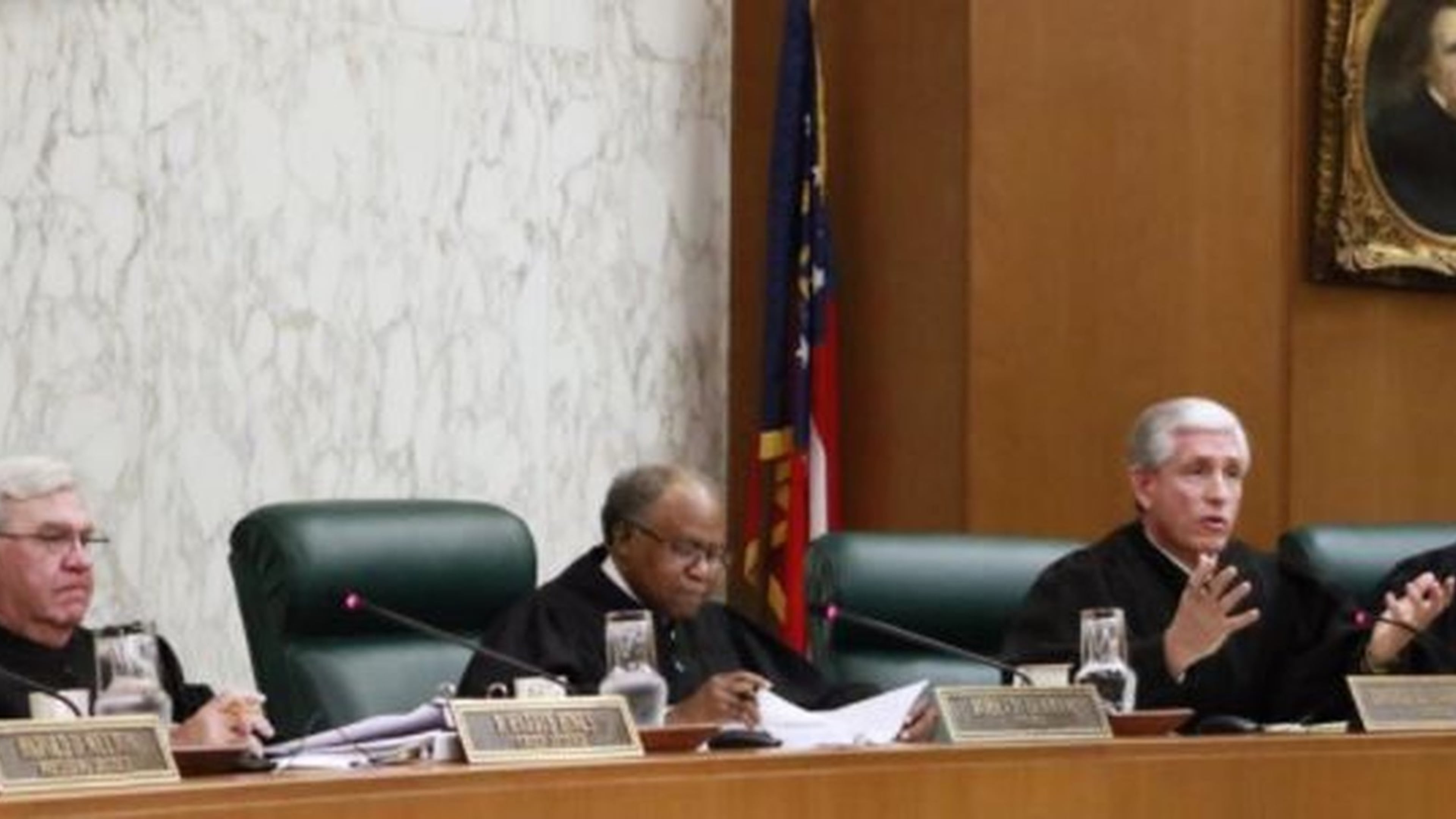 Georgia Supreme Court Justice David Nahmias (second from right), asked whether tax credits are really government money, in a lawsuit involving a $58 million state-authorized program that subsidizes private schools, many of them religious. Plaintiffs argue that’s a violation of the separation of church and state mandate in the state constitution. BOB ANDRES /BANDRES@AJC.COM