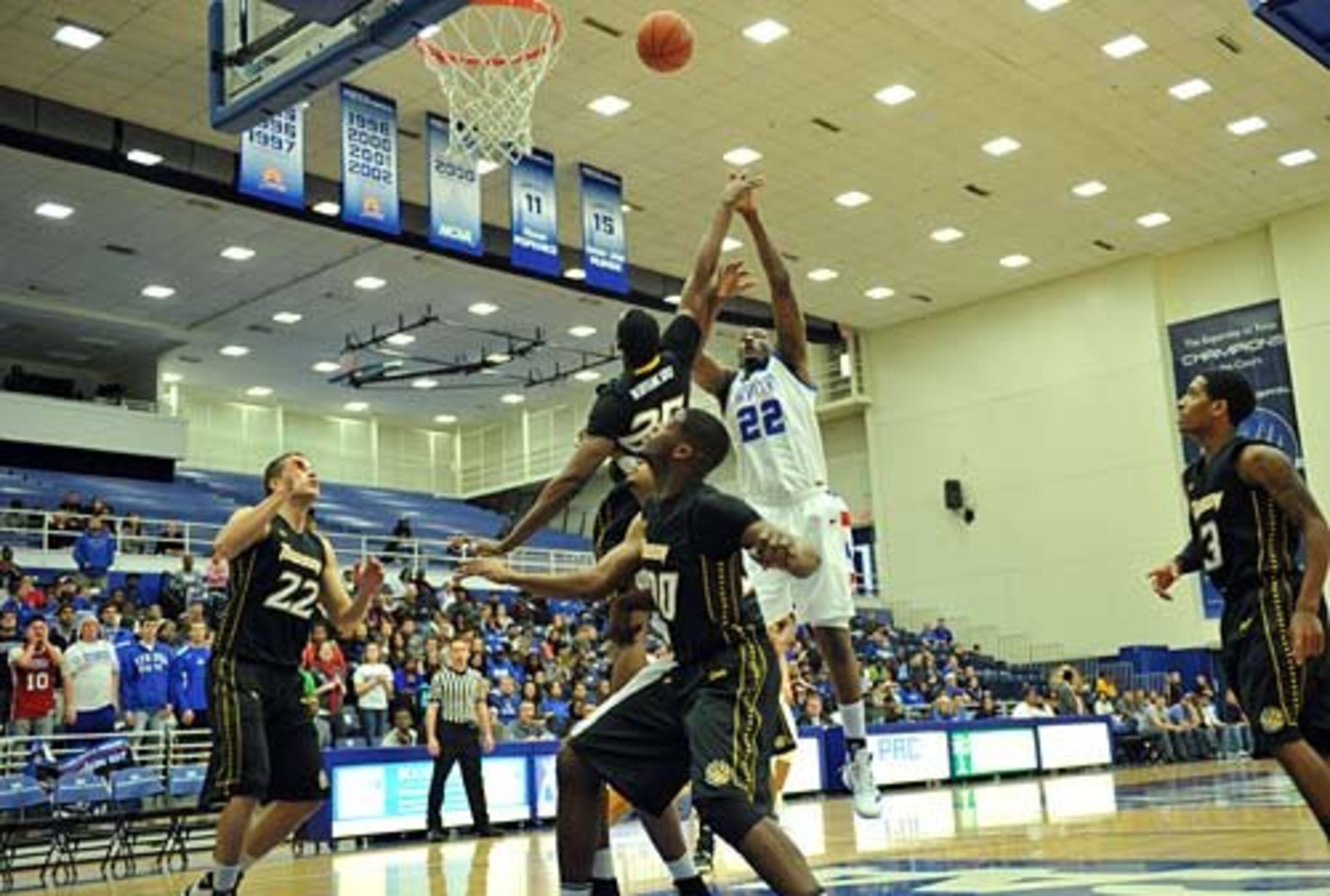 Georgia State center James Vincent (22) shoots against Towson forward Robert Nwankwo (25) in the first half.