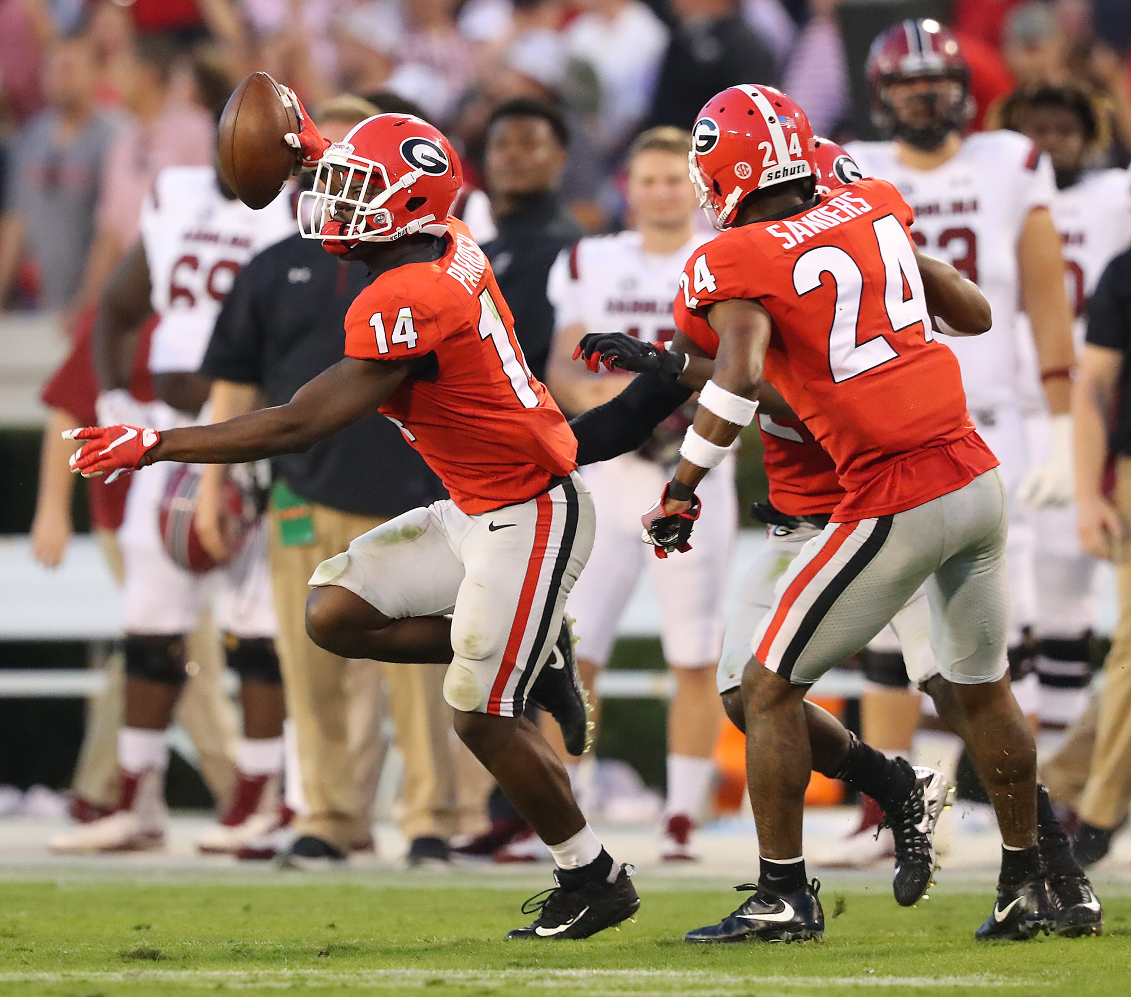 November 4, 2017 Athens: Malkom Parrish celebrates intercepting South Carolina quarterback Jake Bentley in the final minutes of the game for a 24-10 victory and a 9-0 record in a NCAA college football game on Saturday, November 4, 2017, in Athens. Curtis Compton/ccompton@ajc.com