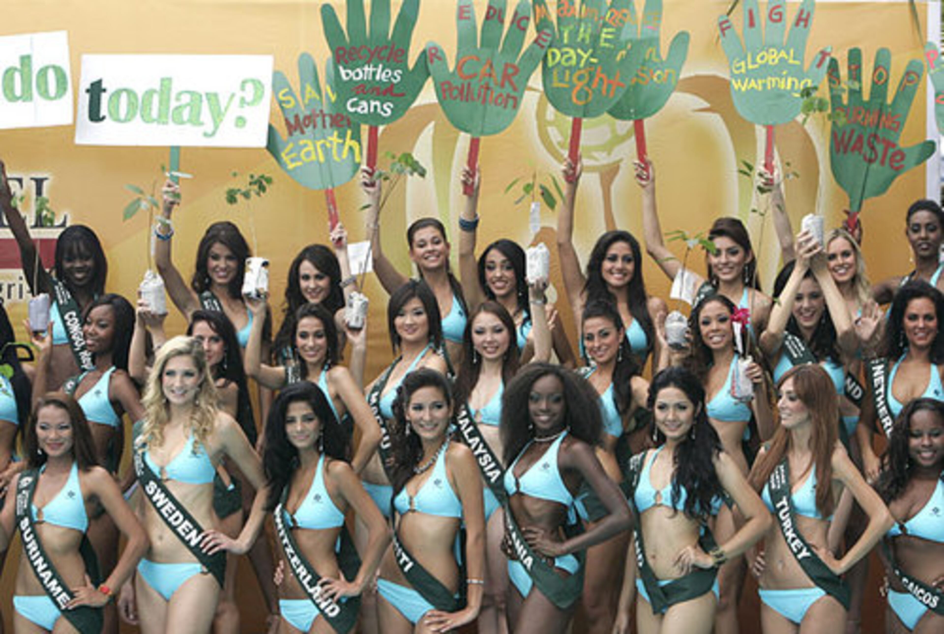 Candidates for the Miss Earth 2008 beauty pageant display save-the-enviornment messages. Miss Earth officials contend theirs is the only beauty pageant with a cause to save mother earth.