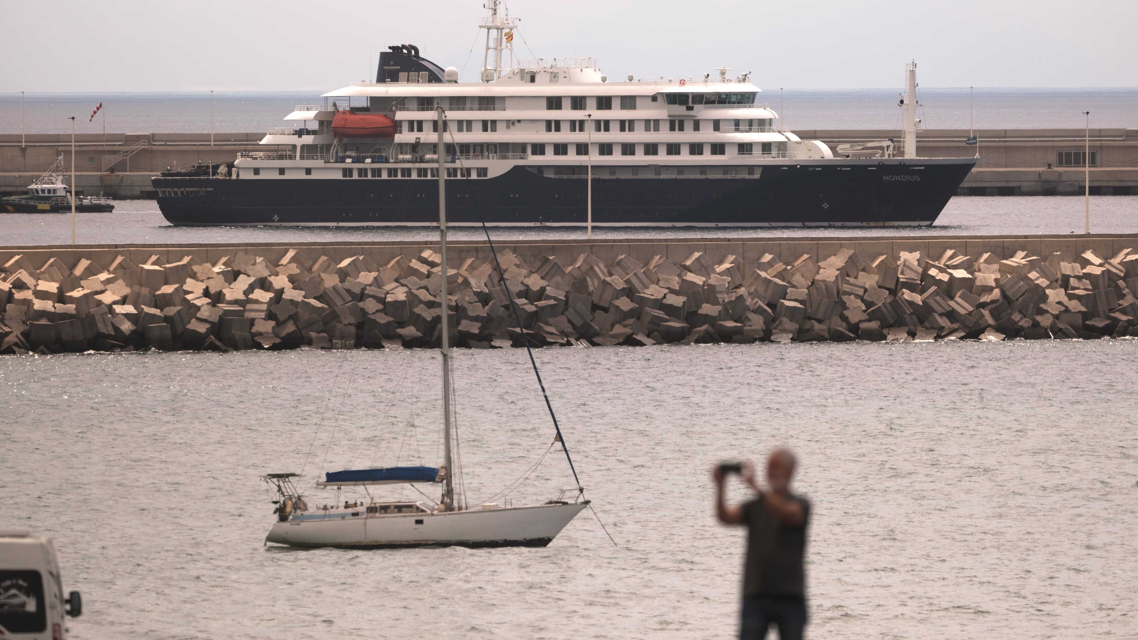 The hantavirus-stricken cruise ship MV Hondius is seen at anchor at the port of Granadilla in Tenerife, Canary Islands, Spain, Monday, May 11, 2026. (AP Photo/Arturo Rodriguez)