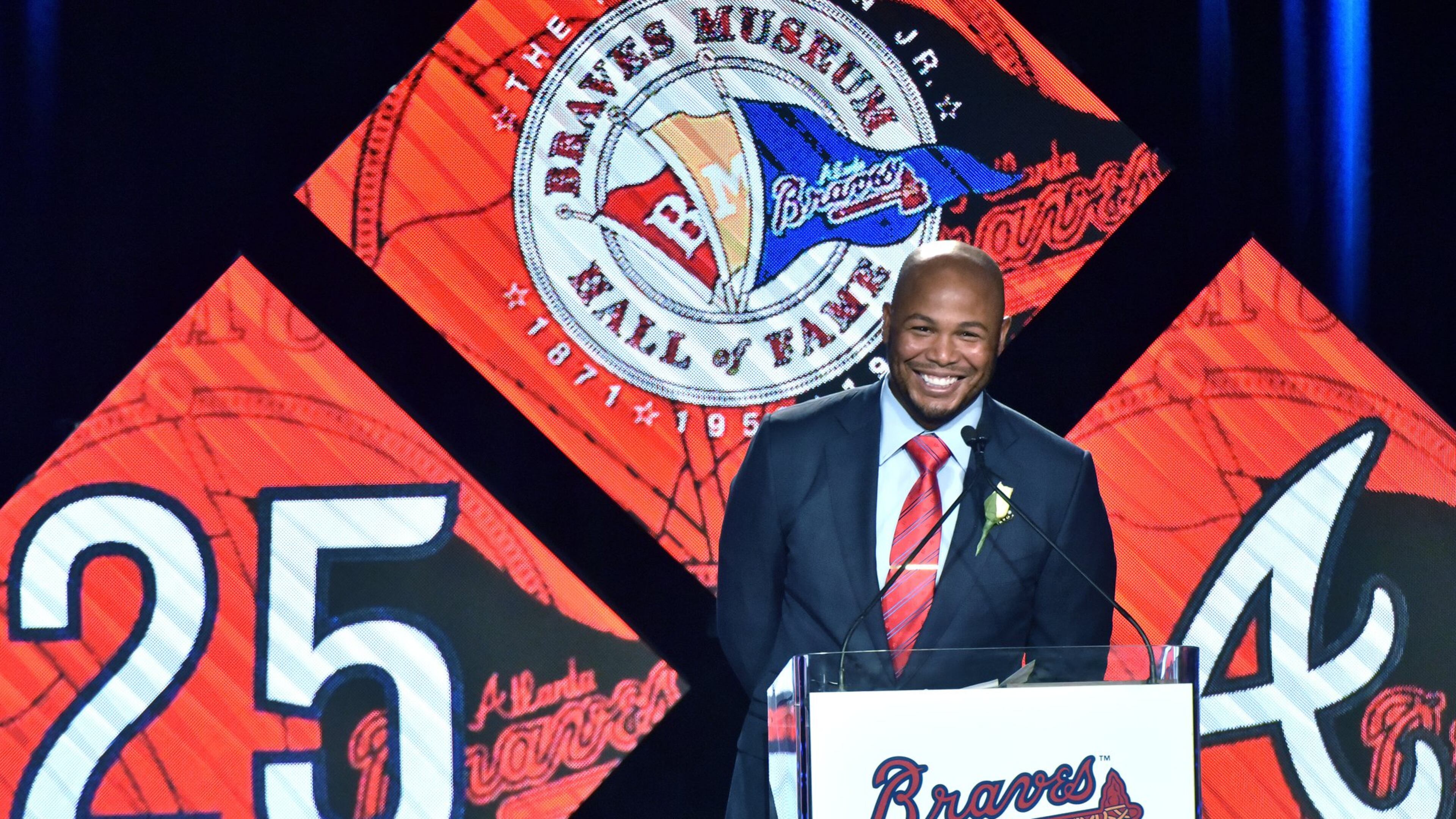 Former Braves outfielder Andruw Jones reacts as he speaks during Braves Hall of Fame luncheon at Hyatt Regency on Friday, August 19, 2016. Braves President John Schuerholz and former outfielder Andruw Jones were inducted into the Braves Hall of Fame. The duo were inducted during a luncheon and honored that evening in a pregame ceremony before the Braves play the Washington Nationals. HYOSUB SHIN / HSHIN@AJC.COM