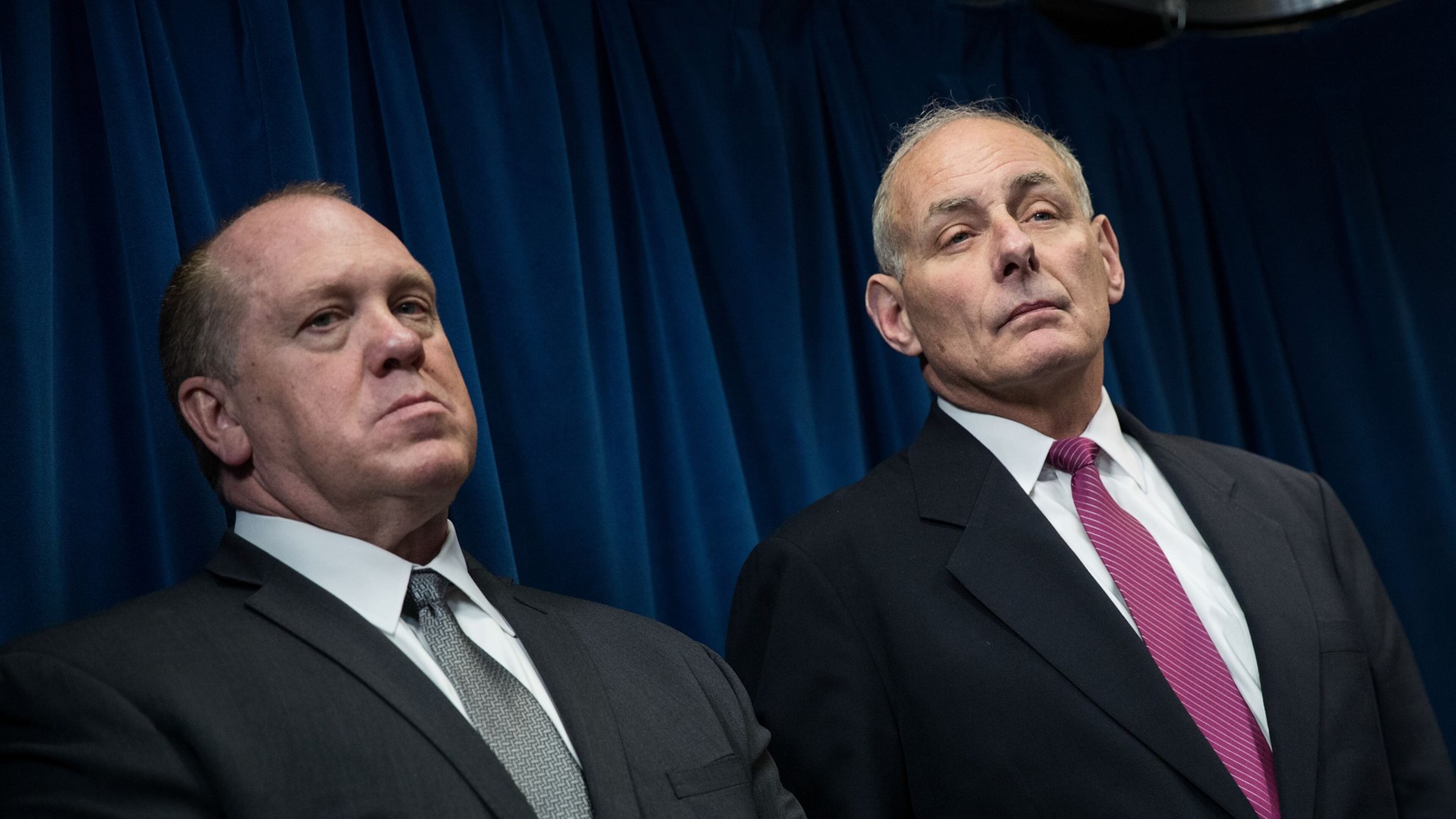 WASHINGTON, DC - JANUARY 31: (L to R) U.S. Immigration and Customs Enforcement (ICE) Acting Director Thomas Homan and Secretary of Homeland Security John Kelly listen to questions during a press conference related to President Donald Trump’s recent executive order concerning travel and refugees, January 31, 2017 in Washington, DC. On Monday night, President Donald Trump fired the acting Attorney General Sally Yates after she released a statement saying the Justice Department would not enforce the president’s executive order that places a temporary ban on citizens from seven Muslim-majority countries. (Photo by Drew Angerer/Getty Images) *** BESTPIX ***