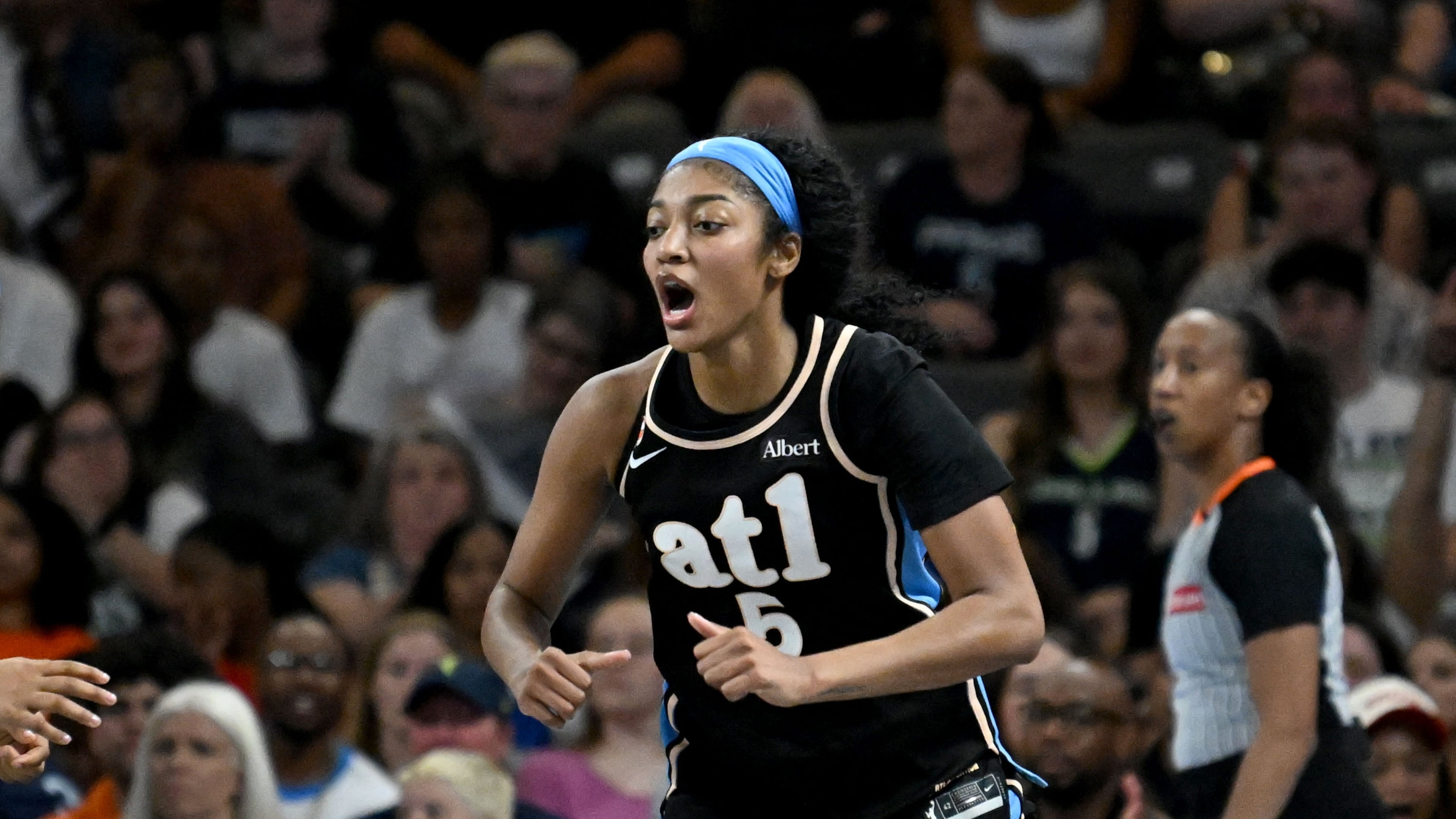 Dream forward Angel Reese reacts after scoring against the Wings on Friday, May 22, 2026, at Gateway Center Arena in Atlanta. Reese had 15 points and nine rebounds. (Hyosub Shin/AJC)
