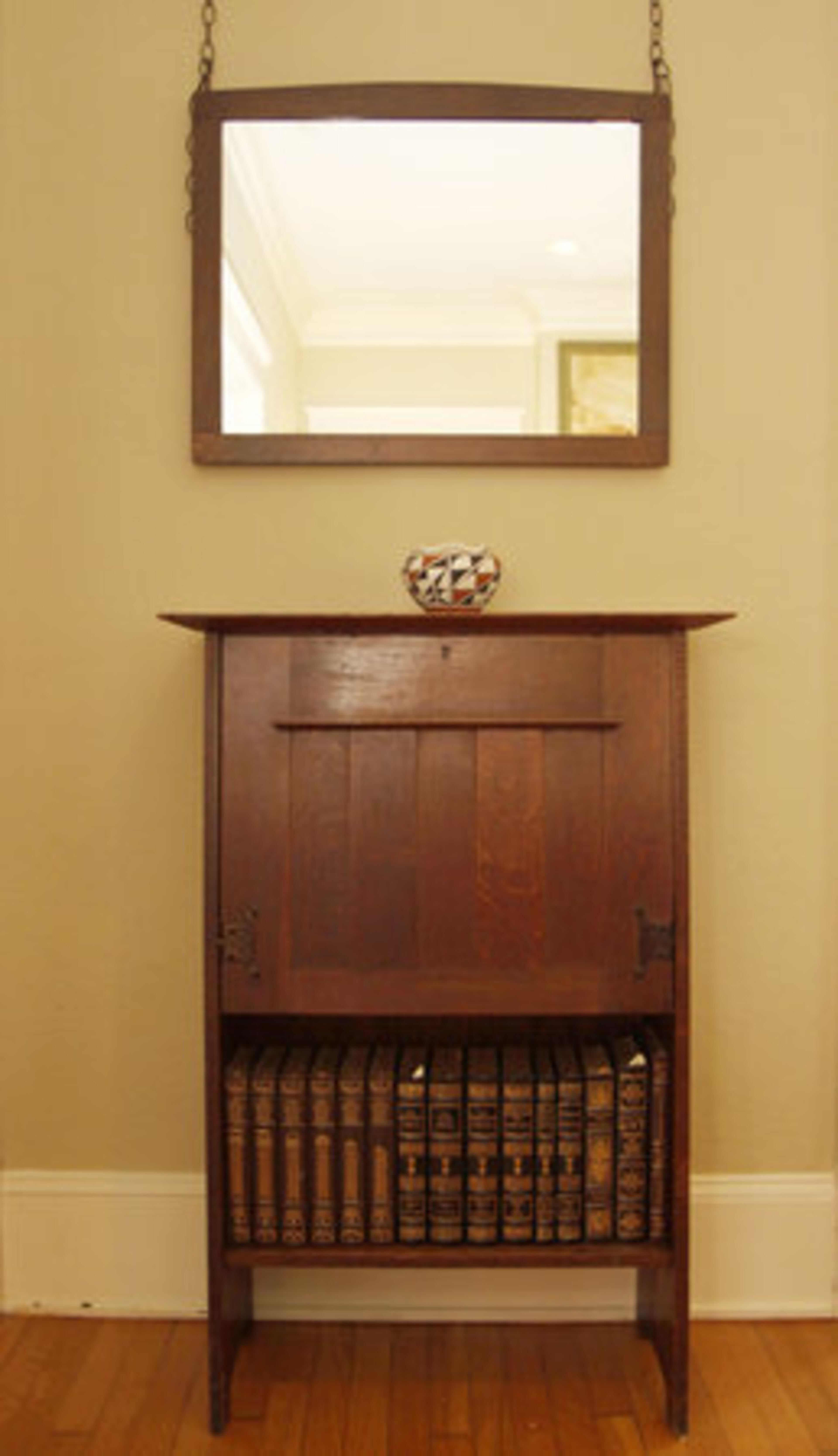 A lady's writing desk in the living room is valued at $3,000 - $4,000, according to Joseph. "If it were a Harvey Ellis inlay it would have been $8,000 - $15,000."