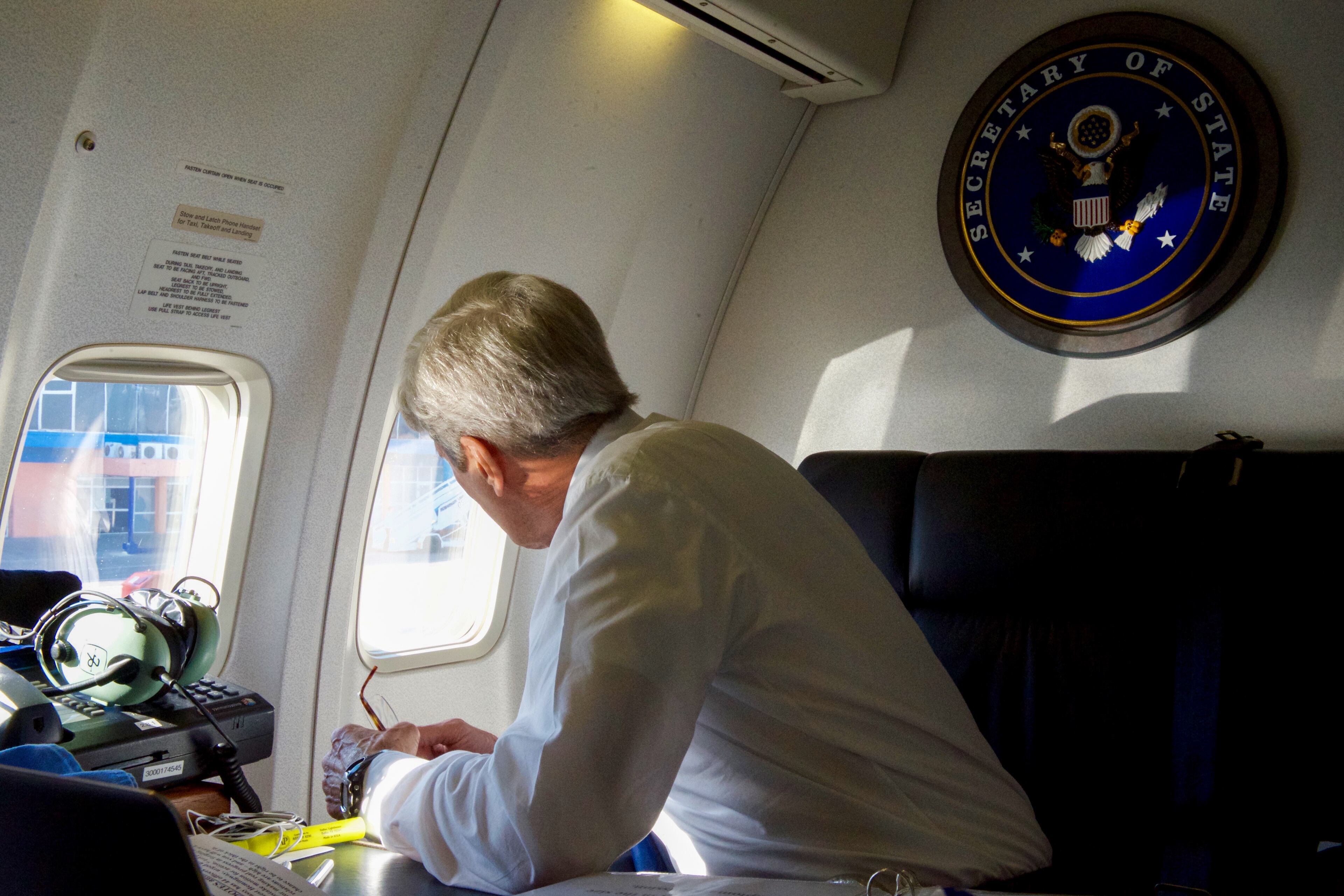 Secretary of State John Kerry looks out of the window at the crowd awaiting him upon his arrival at Jose Marti International Airport in Havana, Aug. 14, 2015. Kerry on Friday attended a flag-raising ceremony at the American Embassy in Cuba and sought to bolster the effort to rebuild ties after more than half a century of hostility. (U.S. Department of State via The New York Times) -- FOR EDITORIAL USE ONLY. --