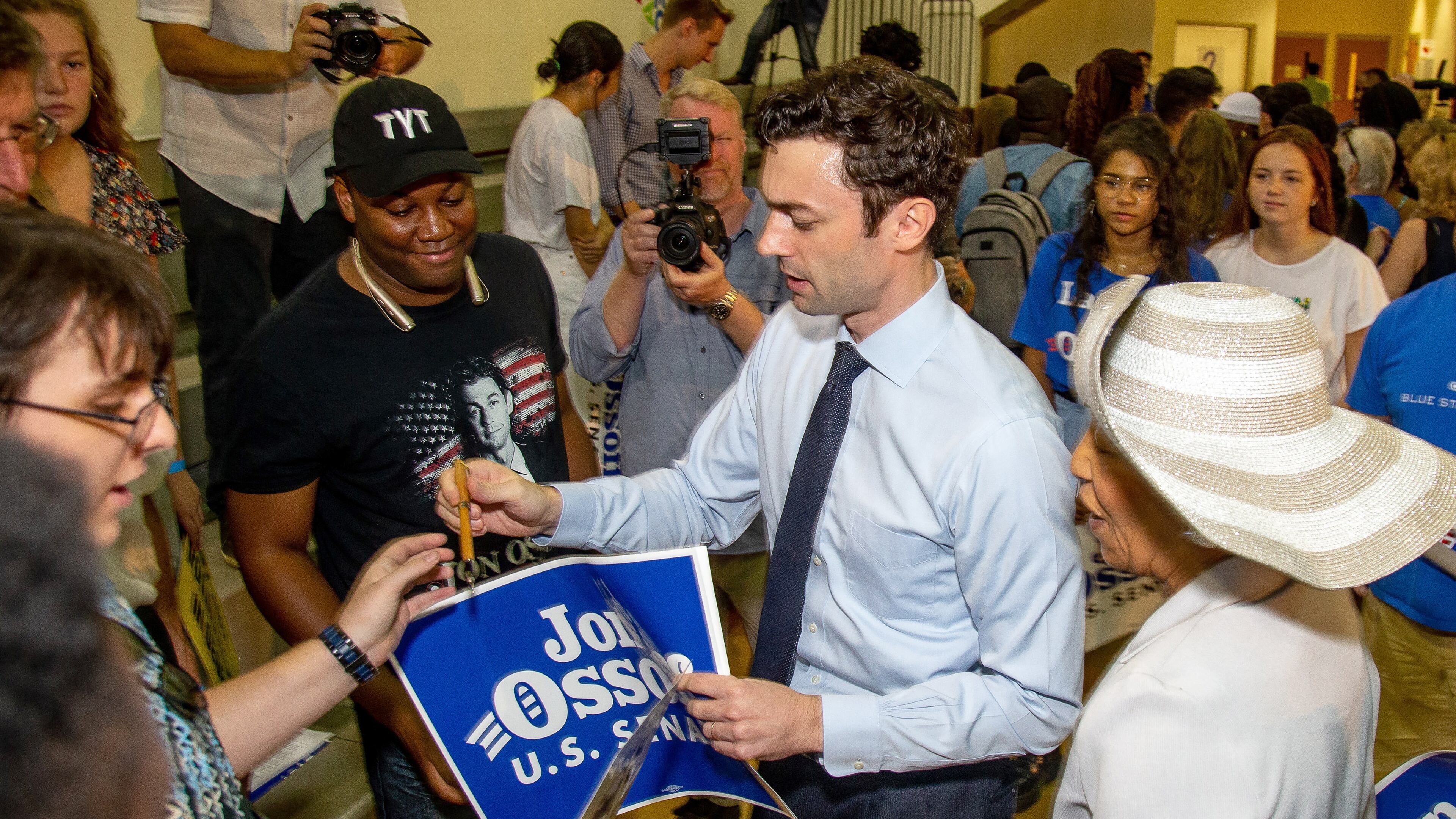Jon Ossoff, a Democratic candidate for one of Georgia's U.S. Senate seats, signs autographs during a voter registration rally at the MLK Receation Center Saturday, September 28, 2019. (Photo: STEVE SCHAEFER / SPECIAL TO THE AJC)