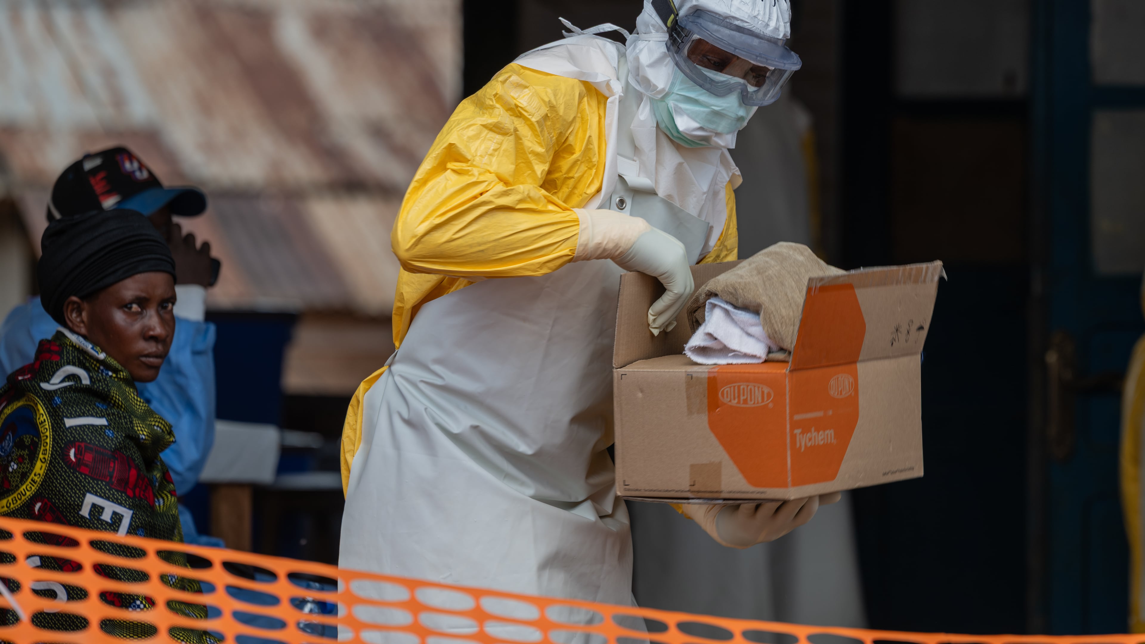A health worker prepares for duty at the Mongbwalu treatment center in Mongbwalu, Congo, Friday, June 5, 2026. (AP Photo/Moses Sawasawa)