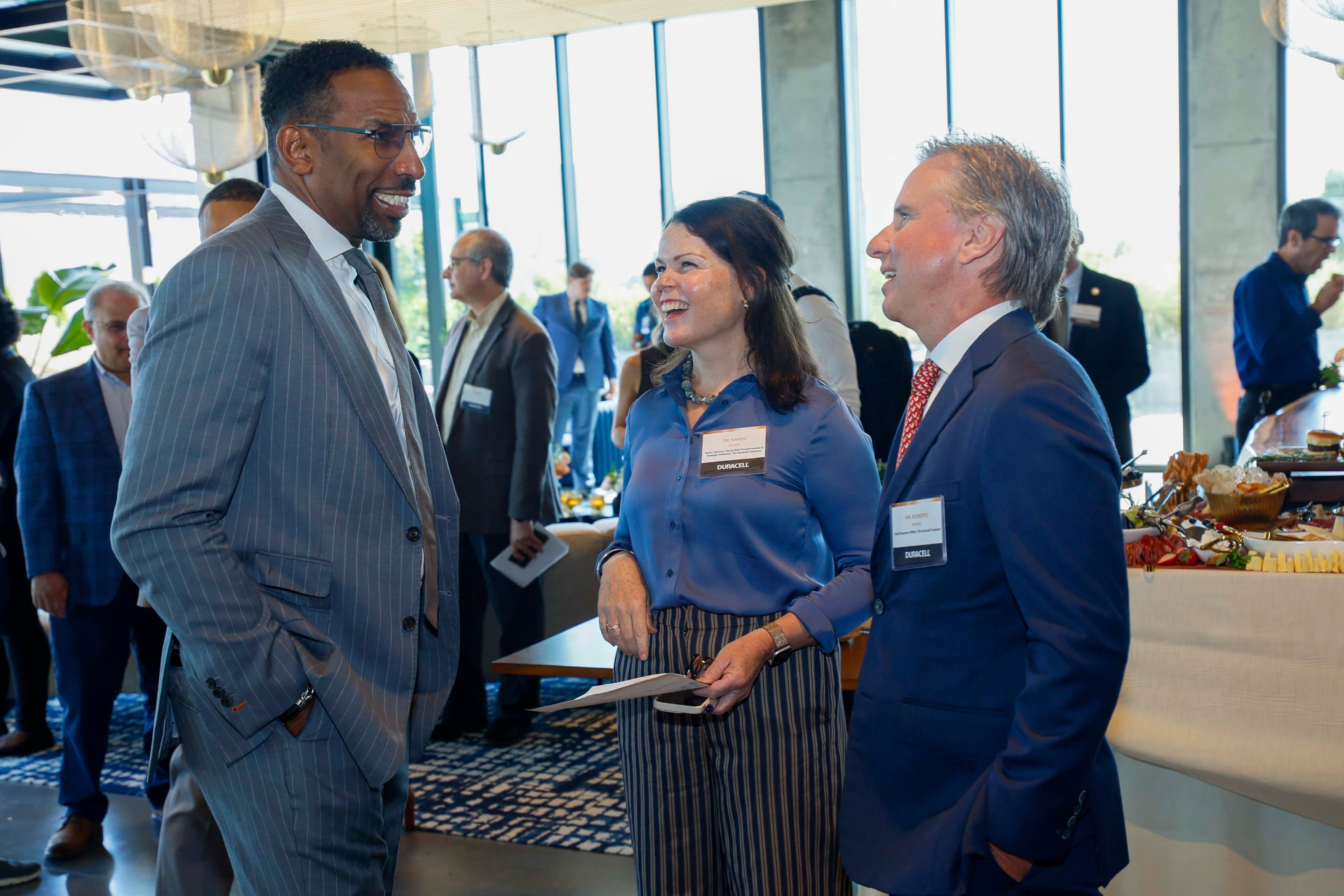 Atlanta Mayor Andre Dickens (left) speaks with Duracell CEO Roberto Mendez (right) and Karen Iveson, Duracell senior director of global R&D innovation and strategic initiatives, on Tuesday, Oct. 6, 2026, before the ribbon-cutting ceremony for the new Duracell global research and development hub at Science Square in Atlanta. (Miguel Martinez/AJC)