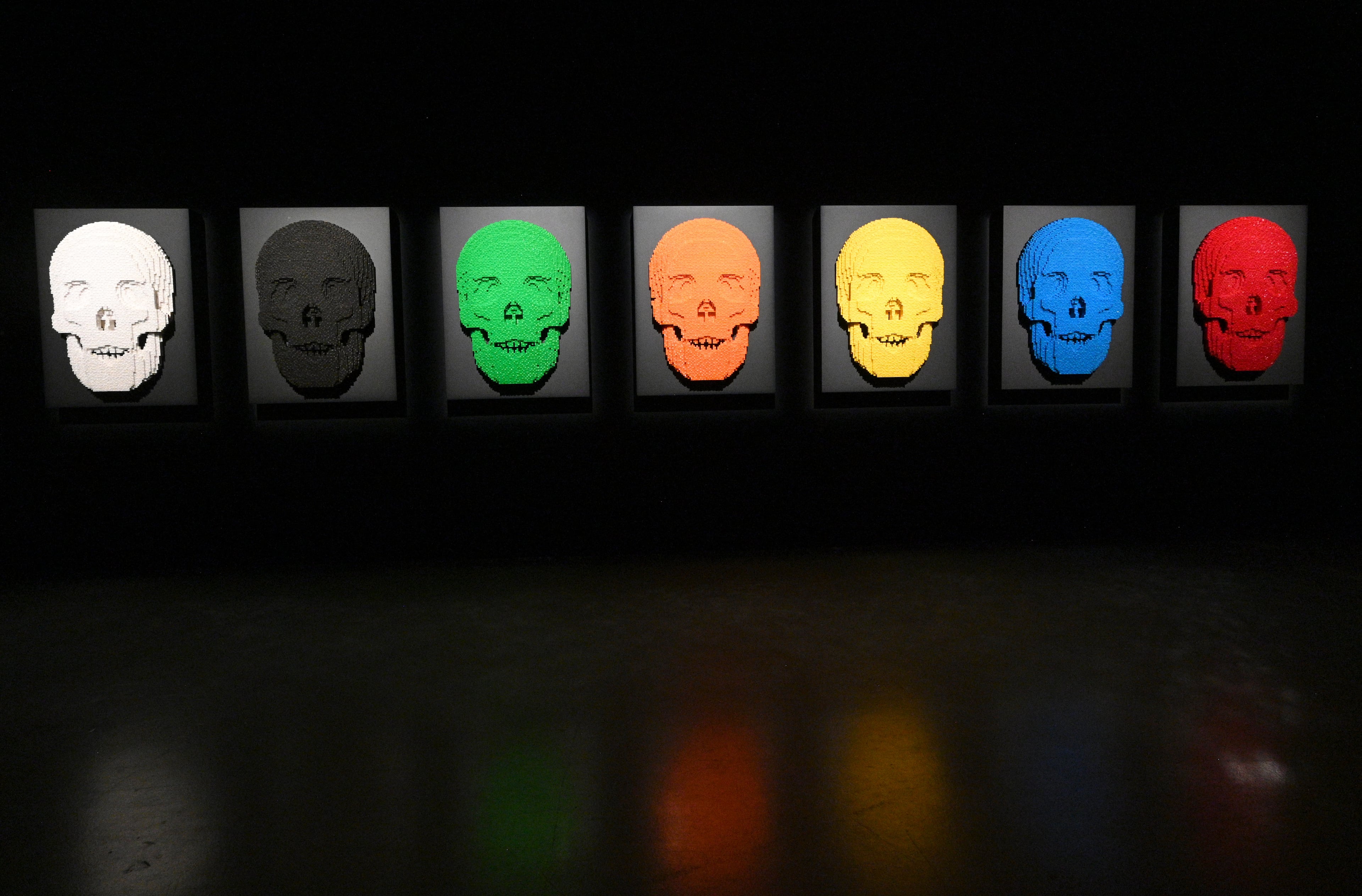 Lego sculptures in “Mask” room at "Art of the Brick Immersive Experience" exhibition at Exhibition Hub Atlanta Art Centre, Wednesday, April 19, 2023, in Doraville. The exhibition will feature many pieces and themes, including a room with oversized sculptures (25-foot long), over 70 works of art crafted from more than 1 million LEGO bricks, galleries celebrating human-kind and nature, and a short documentary about how Nathan creates his works. (Hyosub Shin / Hyosub.Shin@ajc.com)