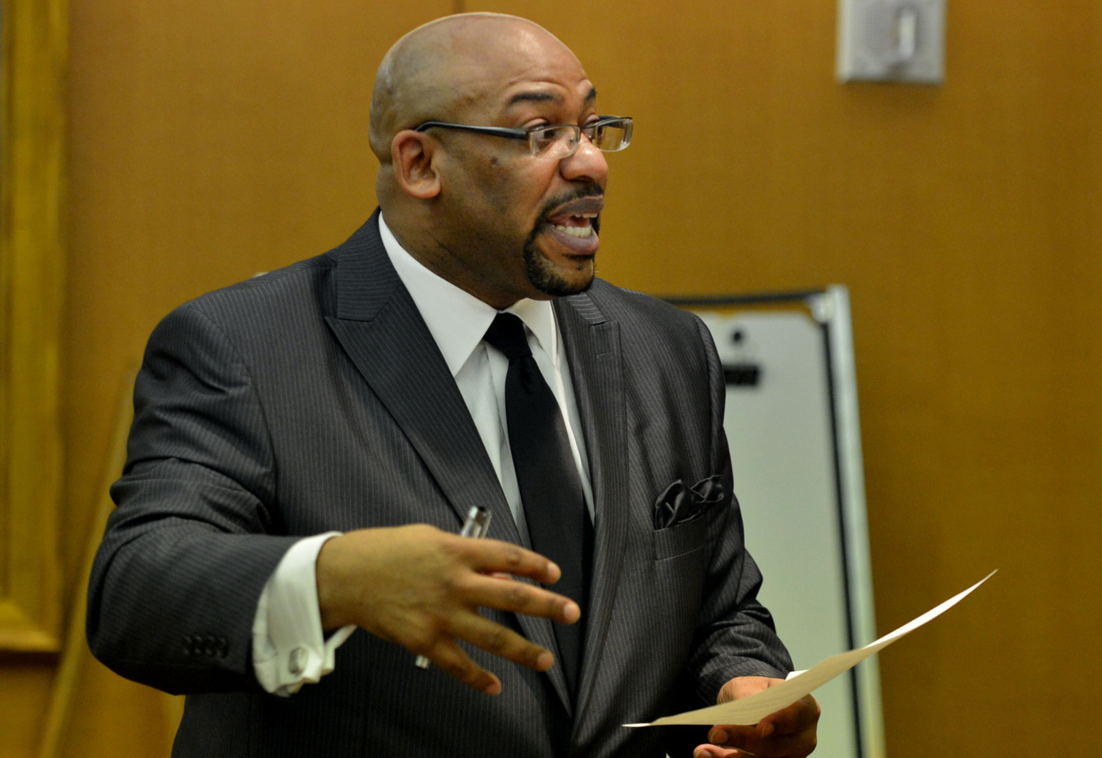 Fulton prosecutor Clint Rucker outlines the plea agreement with Sandra Ward during the hearing. Ward. a former administrator at Parks Middle School, pleaded guilty to a reduced charge. She was sentenced to serve one year probation, repay $5,000 she received in bonus money, perform 250 hours of community service and cooperate with the prosecution. Educators in the Atlanta Public Schools cheating scandal enter pleas before Judge Jerry Baxter in Fulton County Superior Court Friday, February 21, 2014. Any defendants in the widespread Atlanta Public Schools cheating case who don't make guilty pleas by the end of Friday will likely go on trial this spring, including Superintendent Beverly Hall and senior members of her staff. KENT D. JOHNSON / KDJOHNSON@AJC.COM