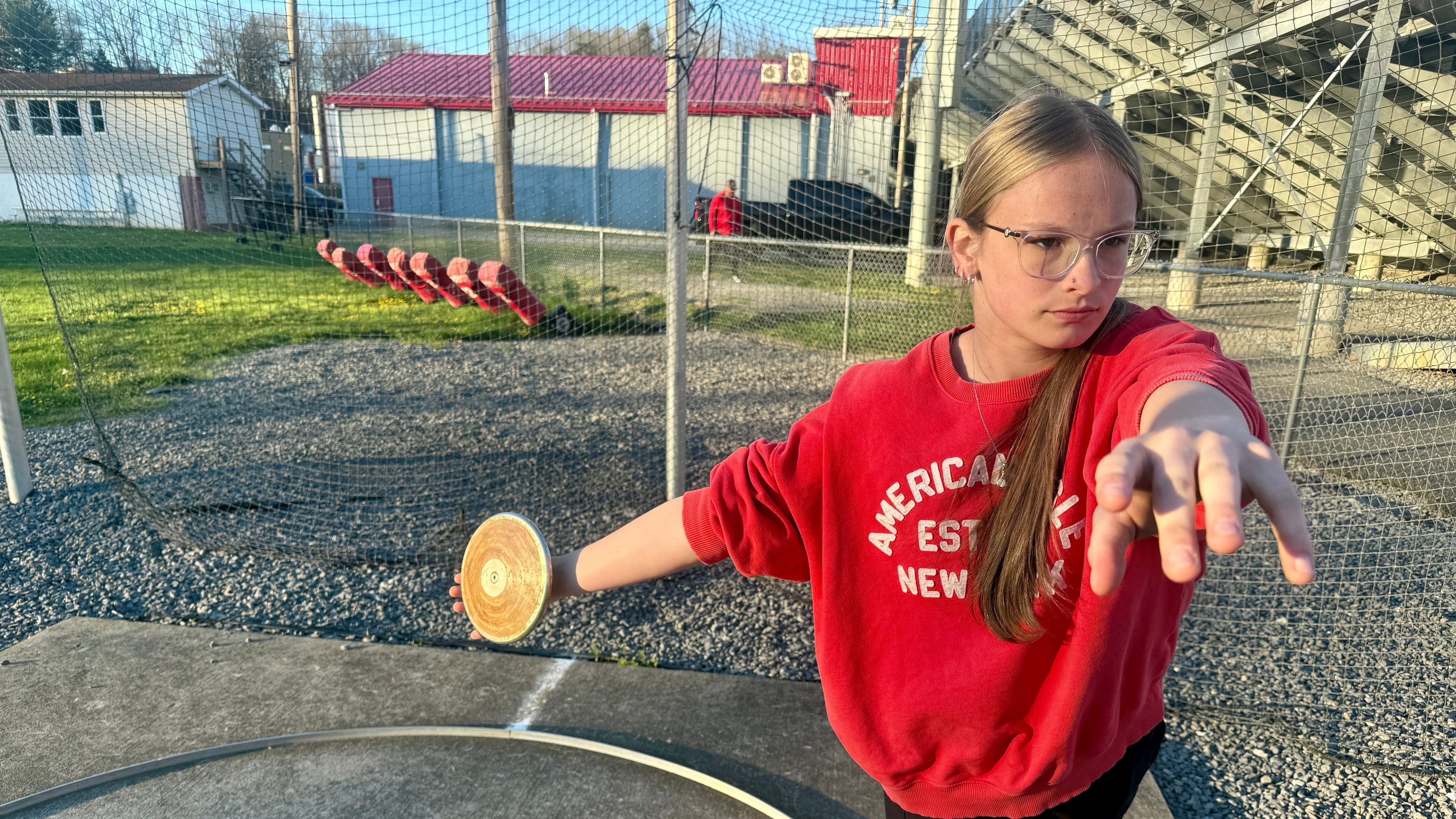 Becky Pepper-Jackson prepares to throw a discus Tuesday, April 7, 2026, at Bridgeport High School in Bridgeport, W.VA. (AP Photo/John Raby)
