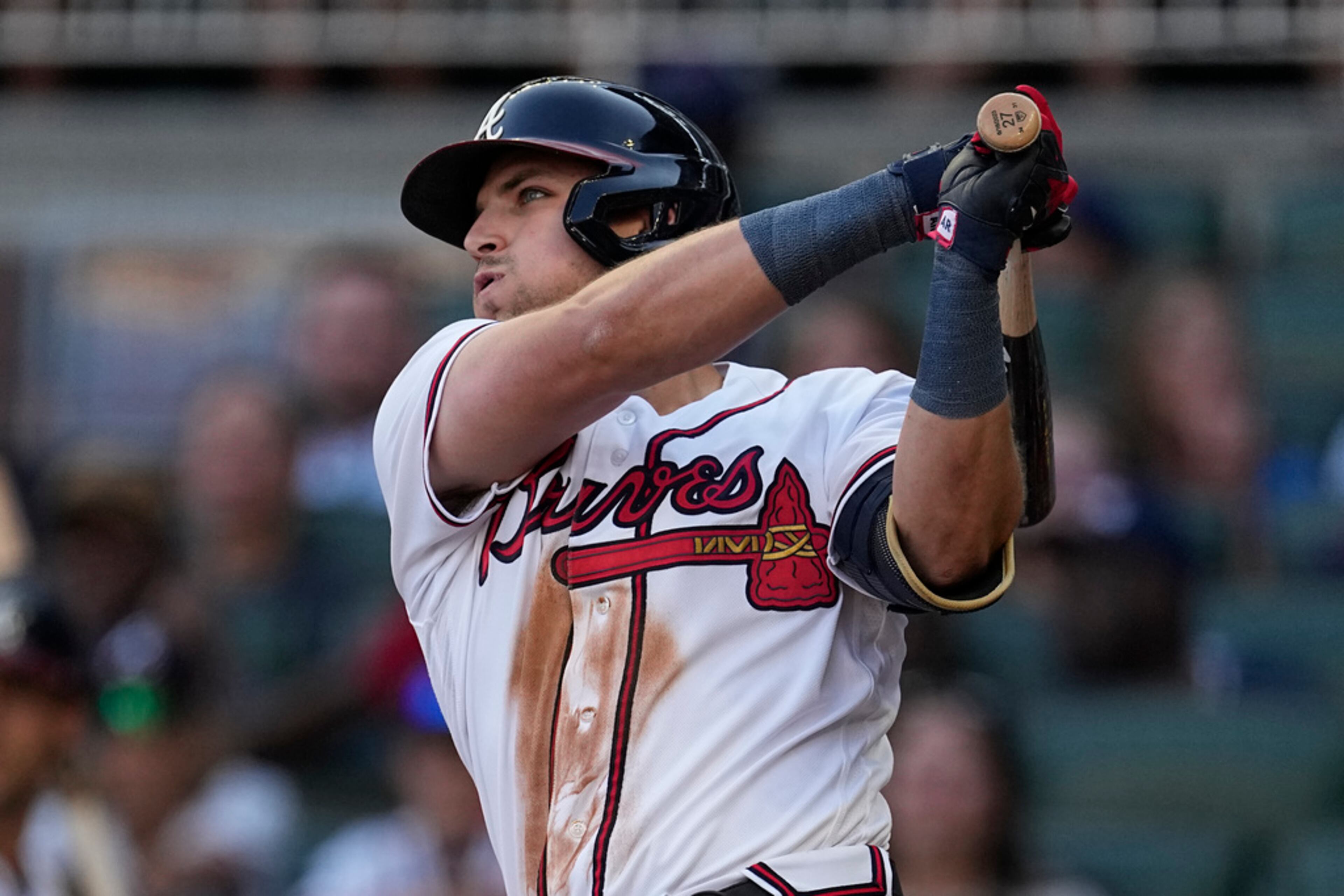 Atlanta Braves' Austin Riley watches his two-run home run against the Minnesota Twins during the first inning of a baseball game Tuesday, June 27, 2023, in Atlanta. (AP Photo/John Bazemore)