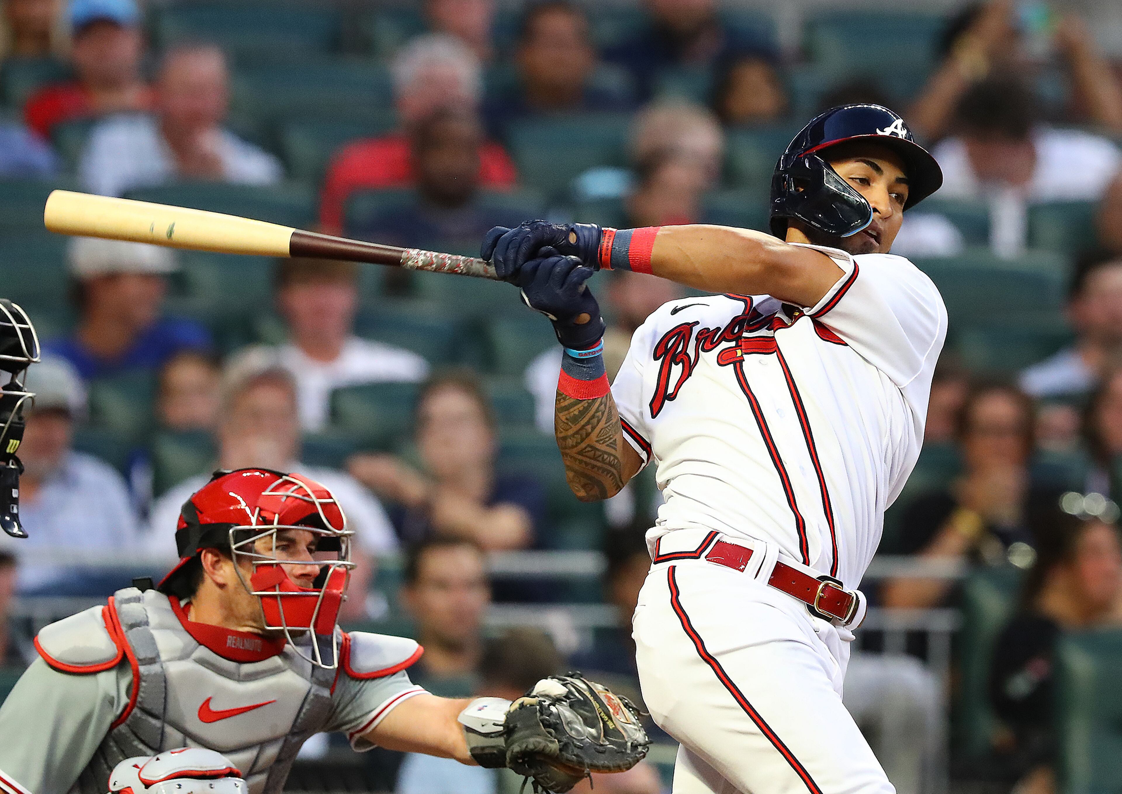 Braves outfielder Eddie Rosario hits a 2-RBI single to take a 2-1 lead over the Philadelphia Phillies during the third inning of a MLB baseball game on Tuesday, August 2, 2022, in Atlanta. “Curtis Compton / Curtis Compton@ajc.com