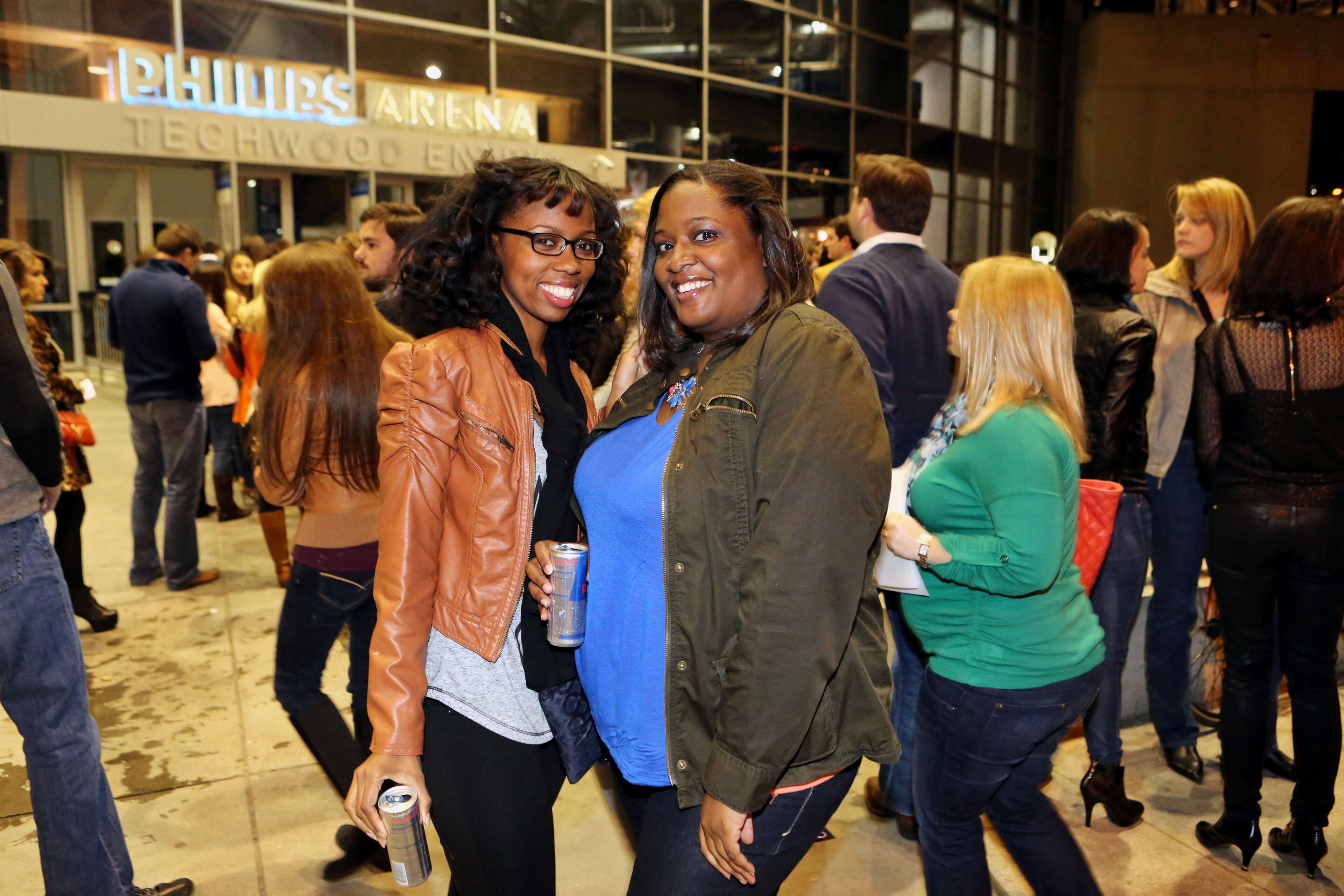 Kyla Bishop and Bianca Lowery get ready for the sold-out Justin Timberlake show during his 20/20 Experience World Tour at Philips Arena in Atlanta crowd Tuesday, Dec. 17, 2013.