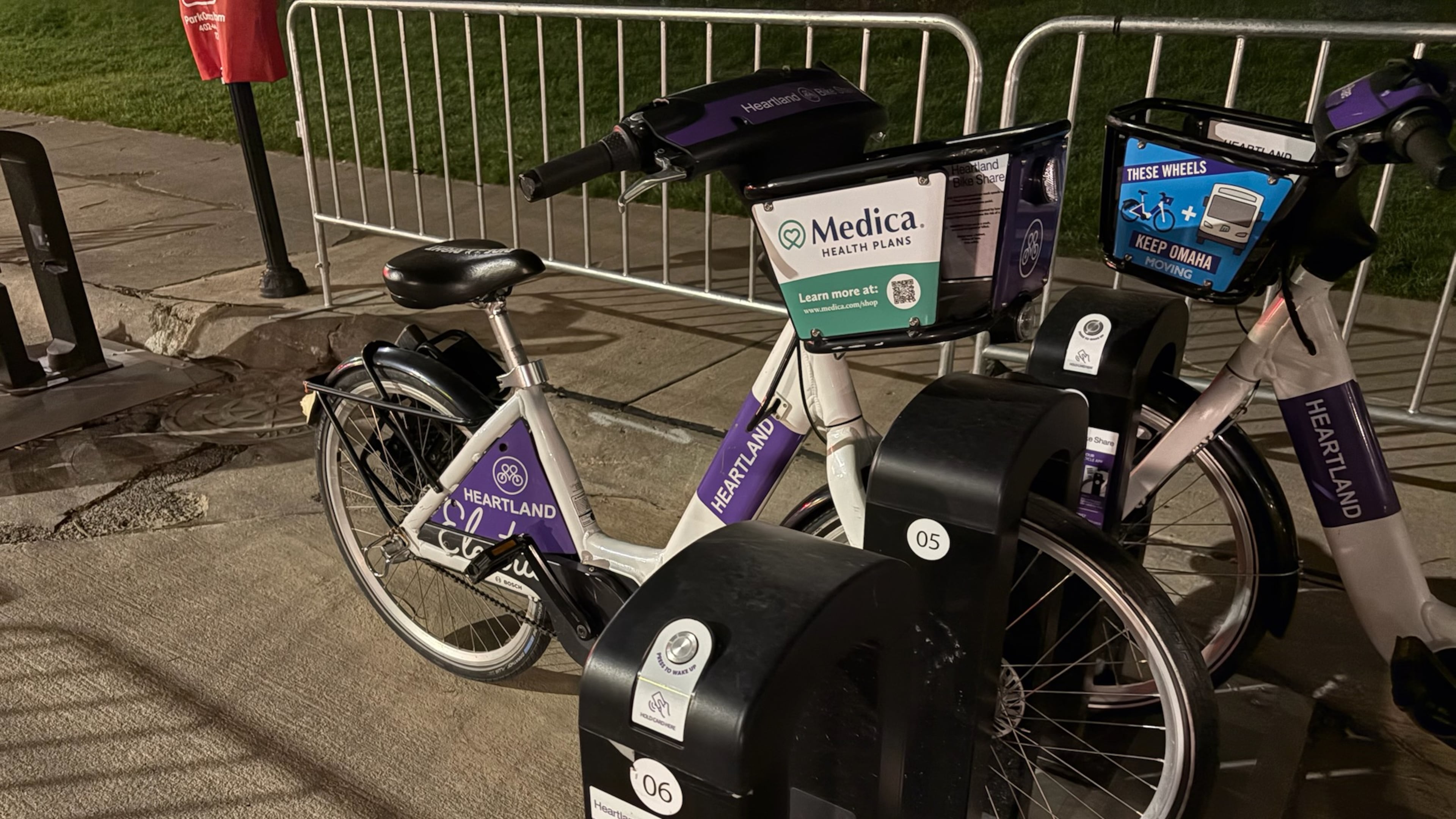 Omaha's Heartland Bike Share program places 400 e-bikes, such as this one, across the metropolitan area for public use. It is free for residents of metropolitan Omaha and a small charge for out-of-town sports columnists. (Ken Sugiura/AJC)