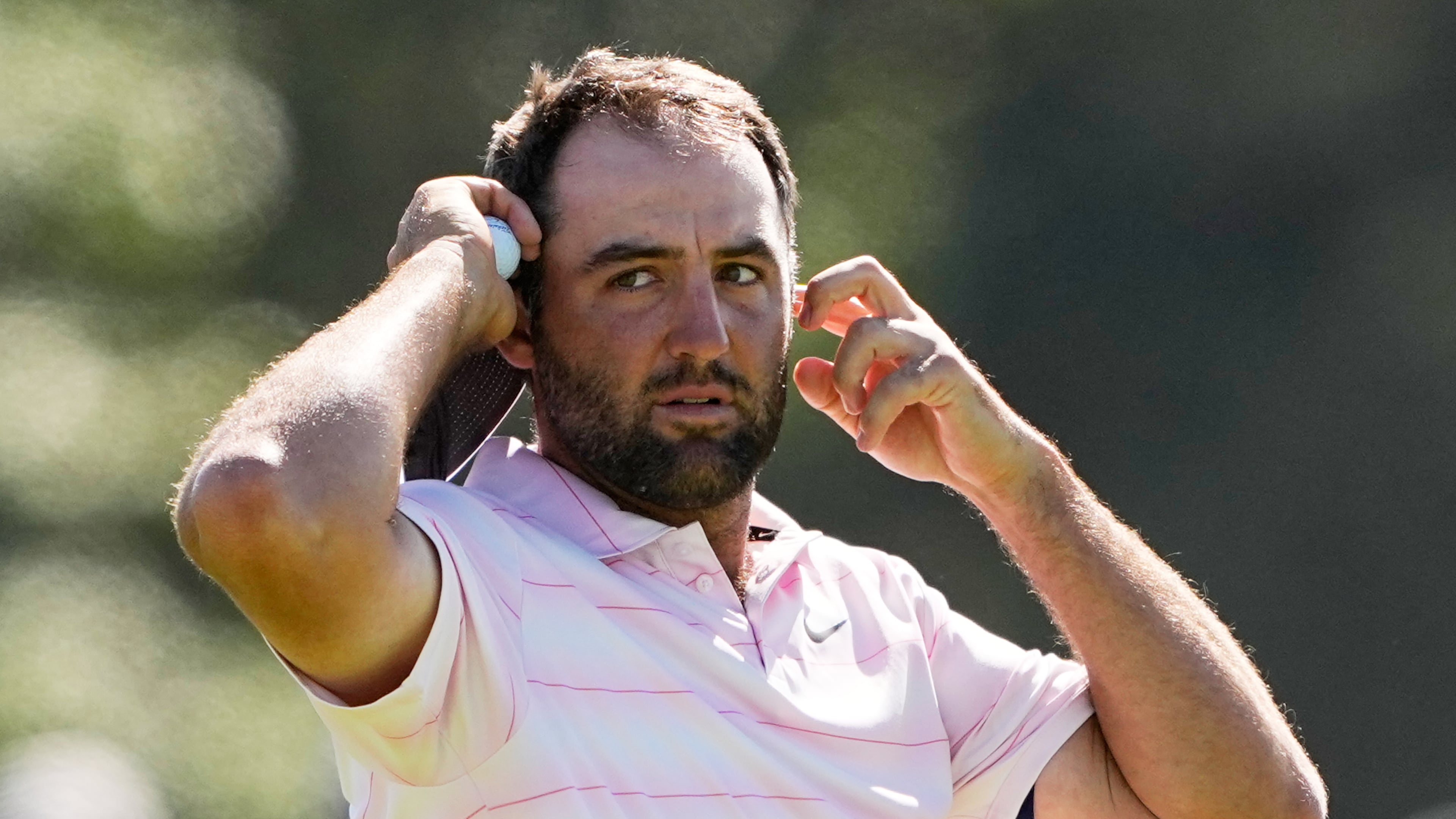 Scottie Scheffler waits to play on the eighth hole during the final round of the U.S. Open golf tournament at Shinnecock Hills Golf Club in Southampton, N.Y., Sunday, June 21, 2026. (AP Photo/Gerald Herbert)