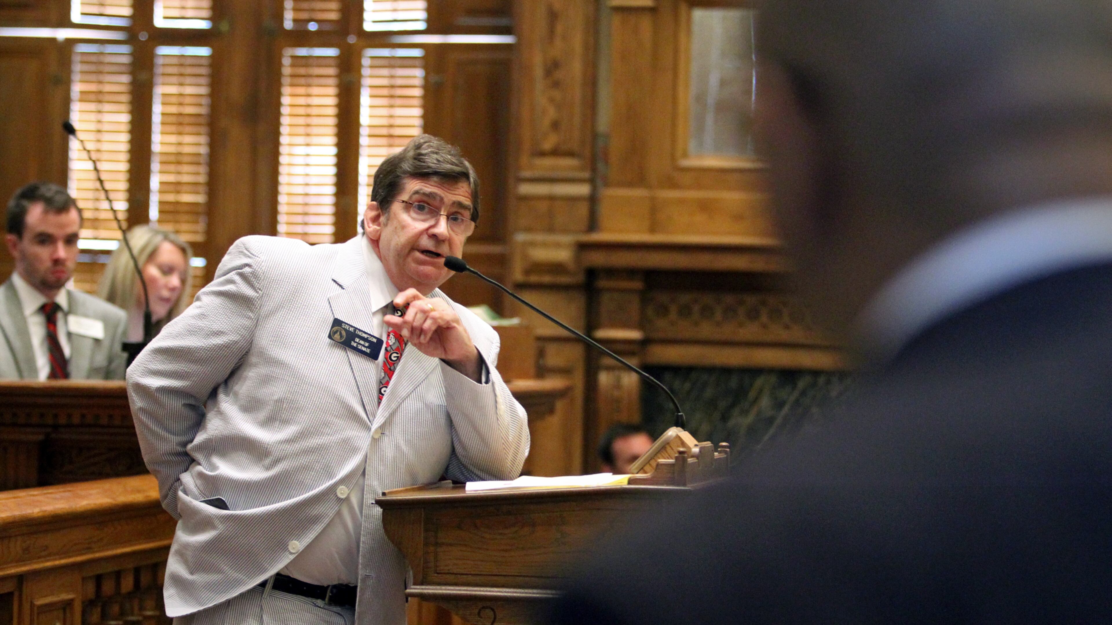 March 19, 2012 ATLANTA: Sen. Steve Thompson, D-Marietta, facing, answers a question from Sen. Lester G. Jackson, D-Savannah, during the debate on HR 1162, Charter School Amendment, during Legislative Day 34 in the Senate Chambers Monday afternoon at the State Capitol in Atlanta, Ga., March 19, 2012. The Georgia Senate passed a resolution Monday that would send a constitutional amendment to voters that would allow them to determine how much authority the state should have to approve and fund charter schools. House Resolution 1162, needed to be approved by a two-thirds majority. It was approved by a vote of 40-16, two more votes than were needed. Democrats had put up a wall of opposition to the resolution, but a pair of Democrats spoke in favor of it on Monday, Sen. George Hooks, and Sen. Steve Thompson. Jason Getz jgetz@ajc.com