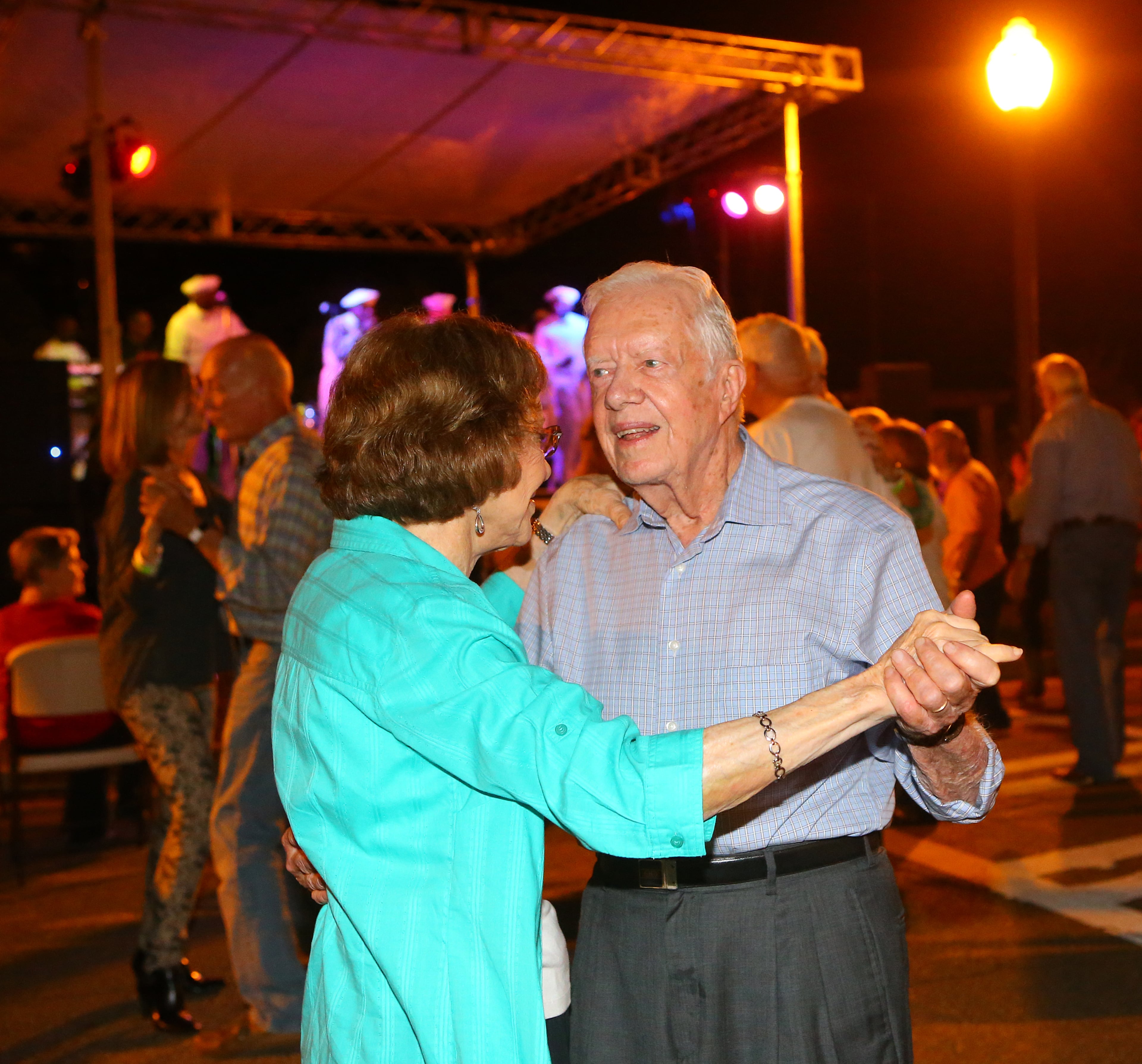 Jimmy Carter and former First Lady Rosalynn Carter join in the Festival Dance on Main Street during the 18th Annual Plains Peanut Festival on Saturday, Sept. 27, 2014, in Plains. CURTIS COMPTON / CCOMPTON@AJC.COM