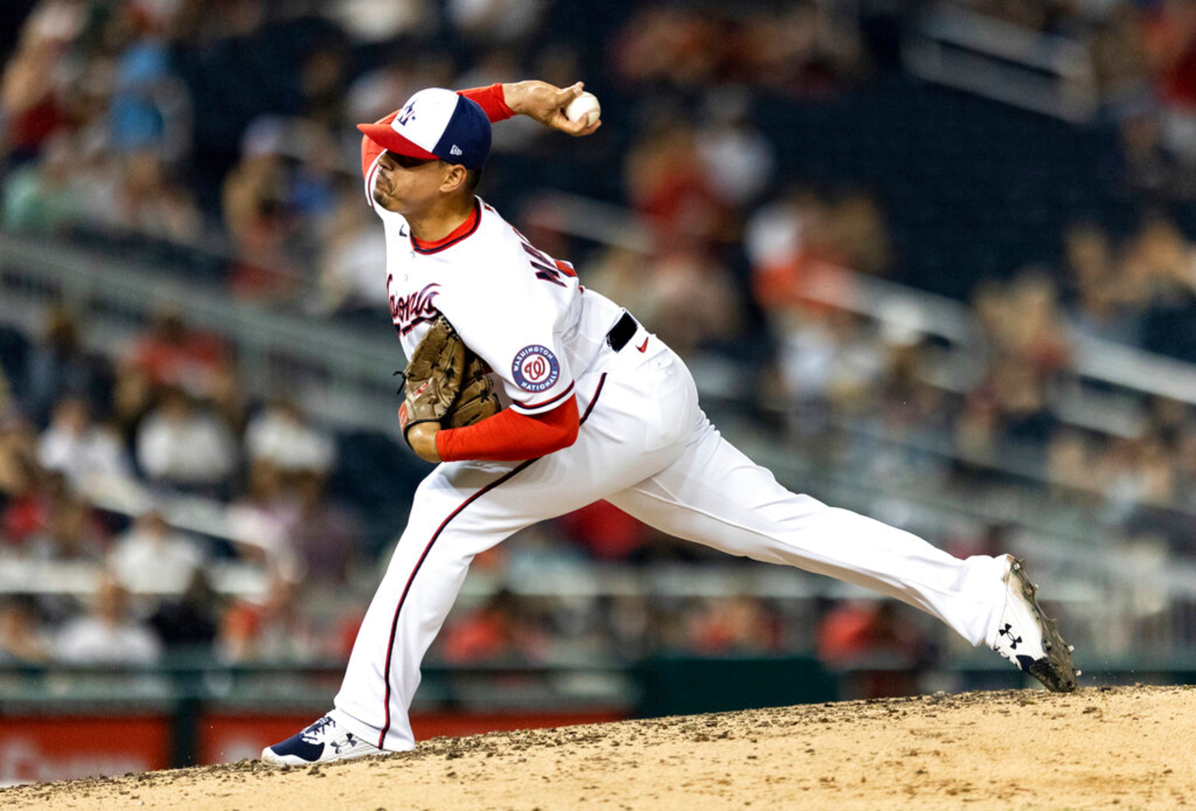 Washington Nationals pitcher Andres Machado throws during the sixth inning of the team's baseball game against the Atlanta Braves on Tuesday, June 14, 2022, in Washington. (AP Photo/Julia Nikhinson)