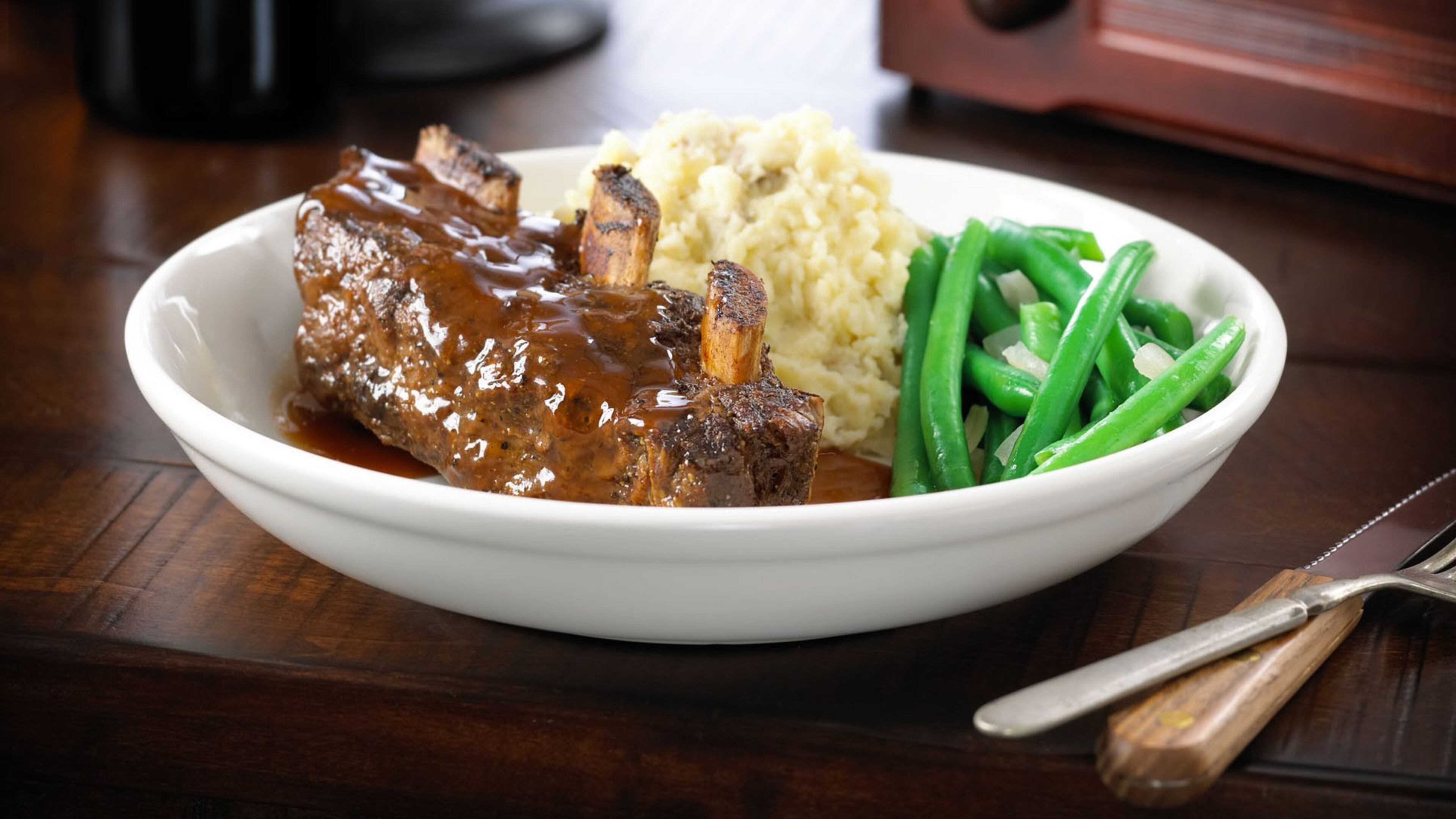 Dine on dishes such as ribs at Savor the Boulevard, an outdoor dining event at Avalon. Photo credit: The Wilbert Group.
