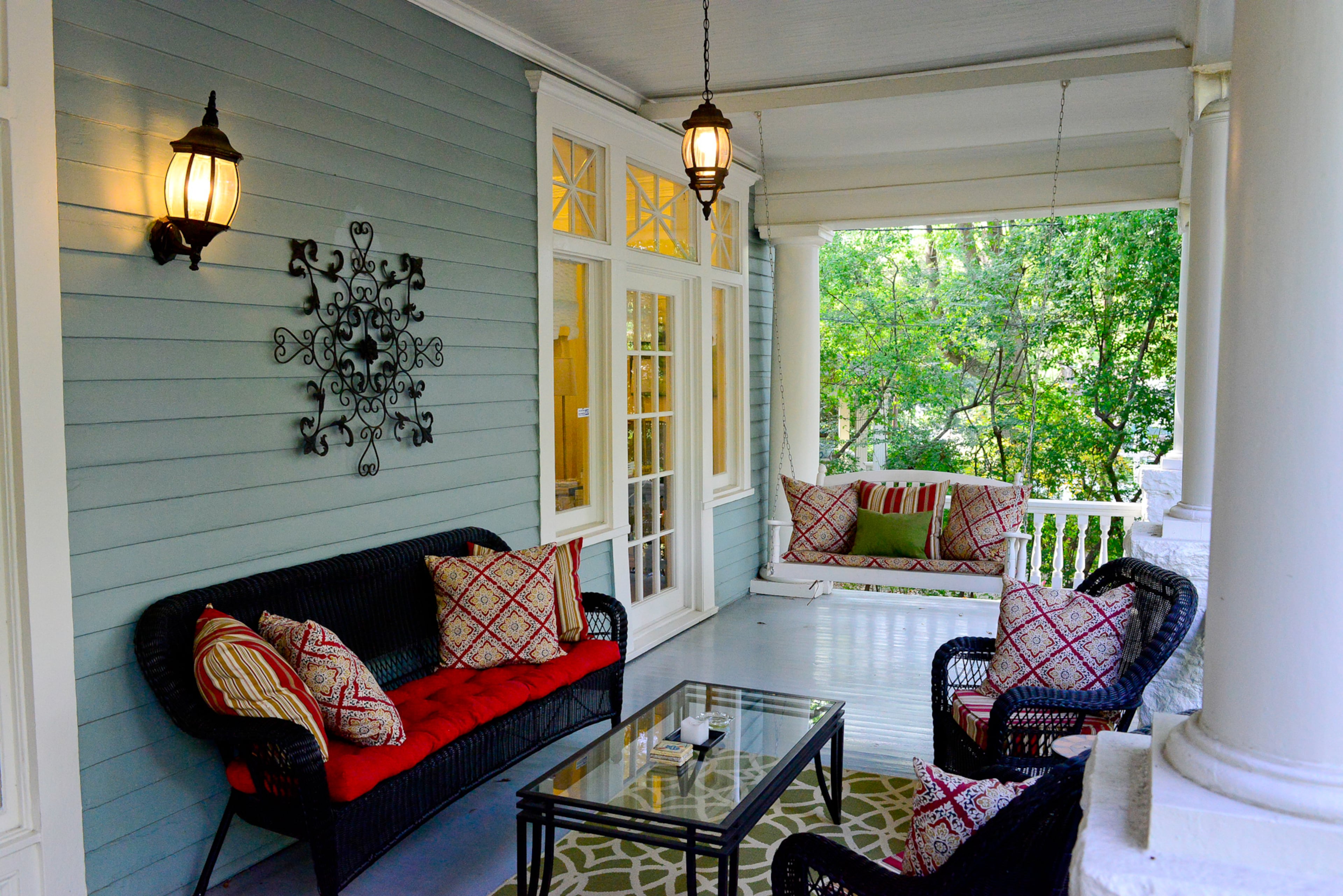 A deep front porch will welcome visitors to Cromwell Baun's American classic revival-style home during the Midtown Tour of Homes on Dec. 6.