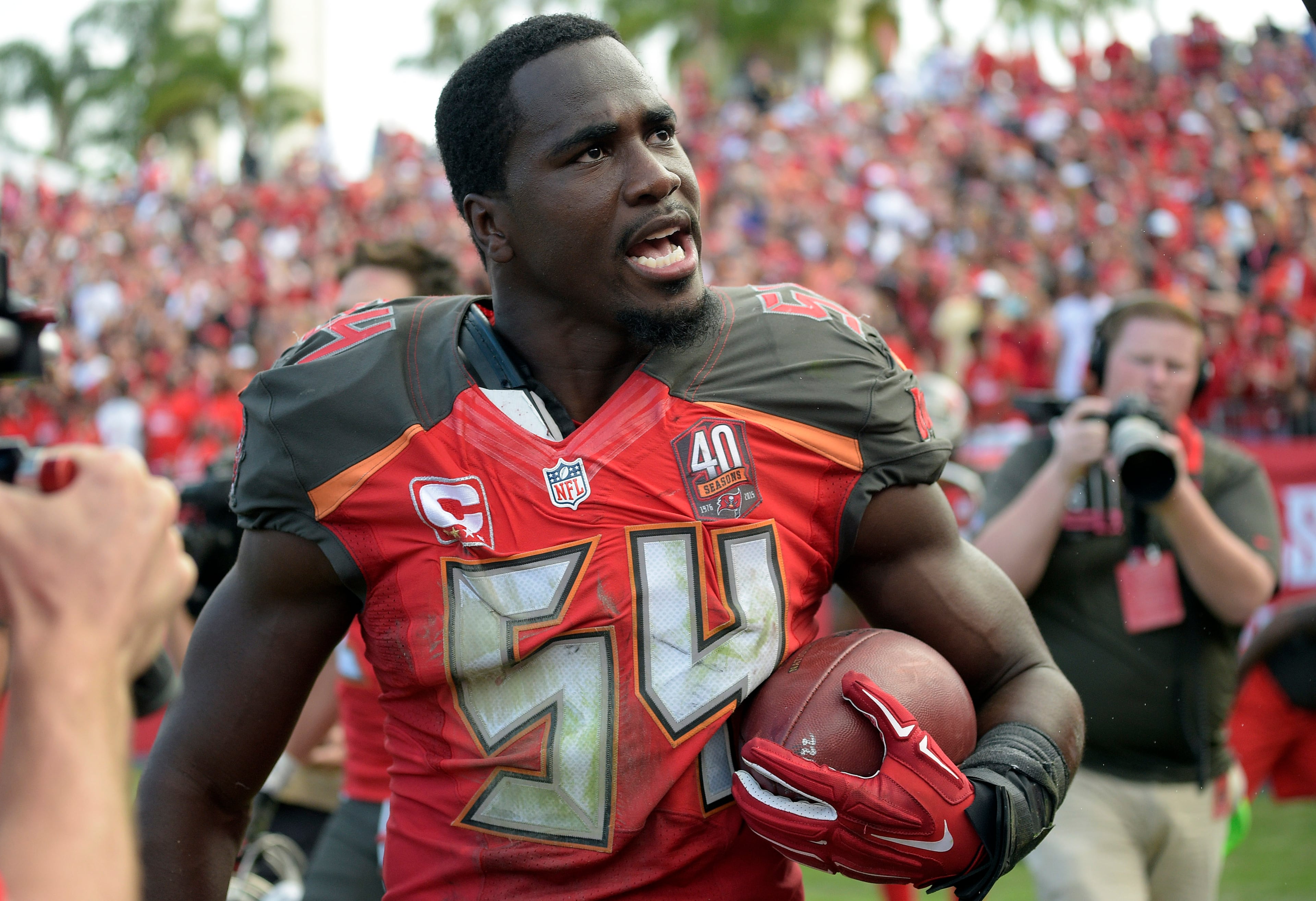 Tampa Bay Buccaneers outside linebacker Lavonte David (54) holds onto the football after intercepting a pass by Atlanta Falcons quarterback Matt Ryan (2) during the fourth quarter of the Buccaneers 23-19 win in an NFL football game Sunday, Dec. 6, 2015, in Tampa, Fla. (AP Photo/Phelan M. Ebenhack)