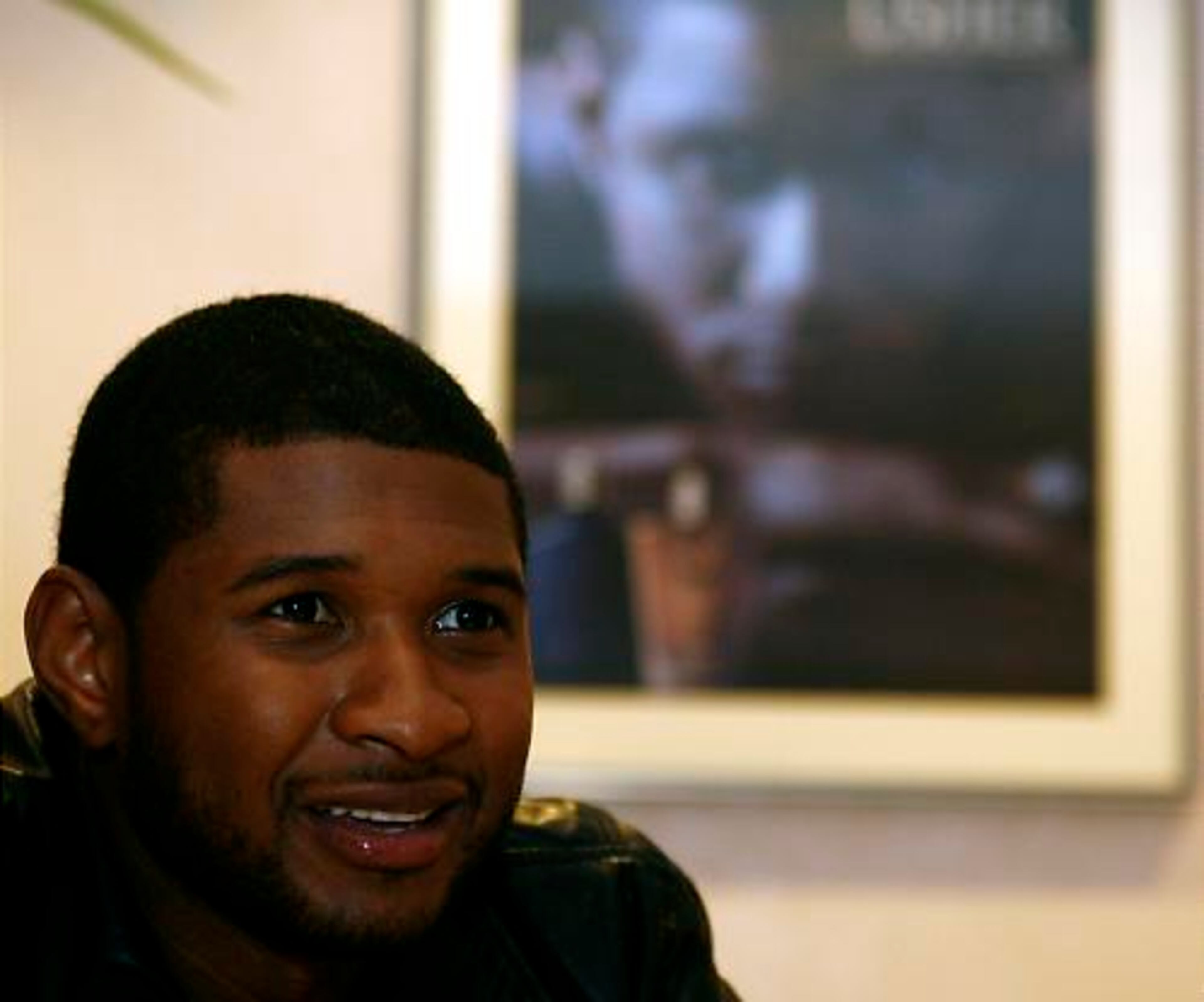 "Though this has been a tumultuous year, I'm so happy about my marriage and my child on the way," says Usher, at Macy's Lenox Square on Thursday to promote his new fragrance line for men and women.