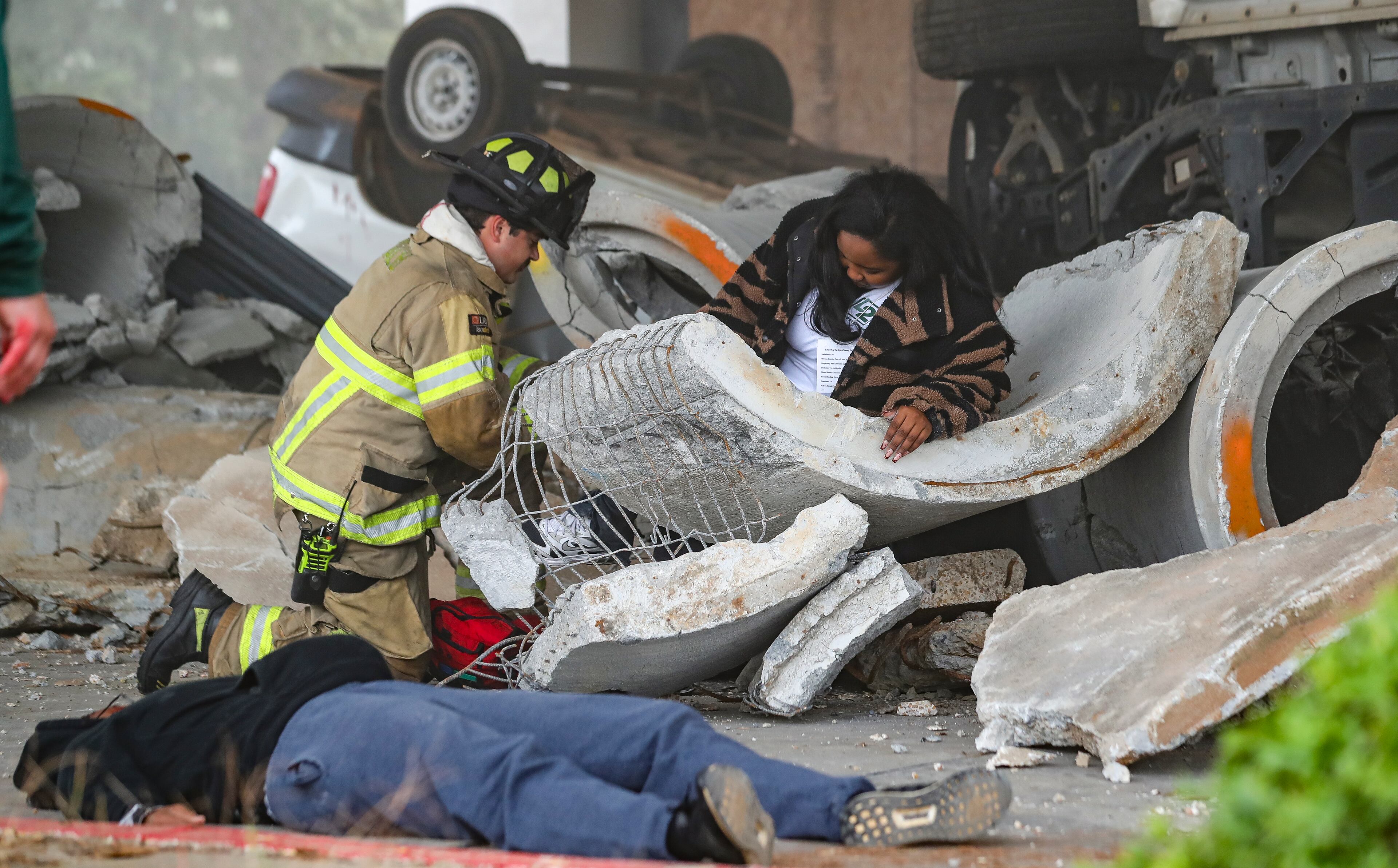 October 19, 2023 FULTON COUNTY: Here firefighters from several metro jurisdictions train at the Knights Inn located at 4253 Shirley Drive SW. The Atlanta Regional Commission’s Homeland Security & Emergency Preparedness Department first-ever Atlanta Regional Full-Scale Emergency Training Exercise was held on Thursday, Oct. 19, 2023 on Fulton Industrial Boulevard at two nearby locations. Emergency responders from the City of Atlanta and five metro Atlanta counties – Clayton, Cobb, DeKalb, Fulton, and Gwinnett all jointly participated in the daylong event Daylong that simulated a terrorist attack on a hotel. Firefighters trained at the Knights Inn located at 4253 Shirley Drive SW and the police at the Red Roof Inn 4430 Frederick Drive SW. Police and fire vehicles, SWAT teams, Hazardous materials crews, Search & rescue teams and Victim triage were all on hand during the event which saw 50-victim volunteers in realistic disaster scenarios and scenes. (John Spink / John.Spink@ajc.com)