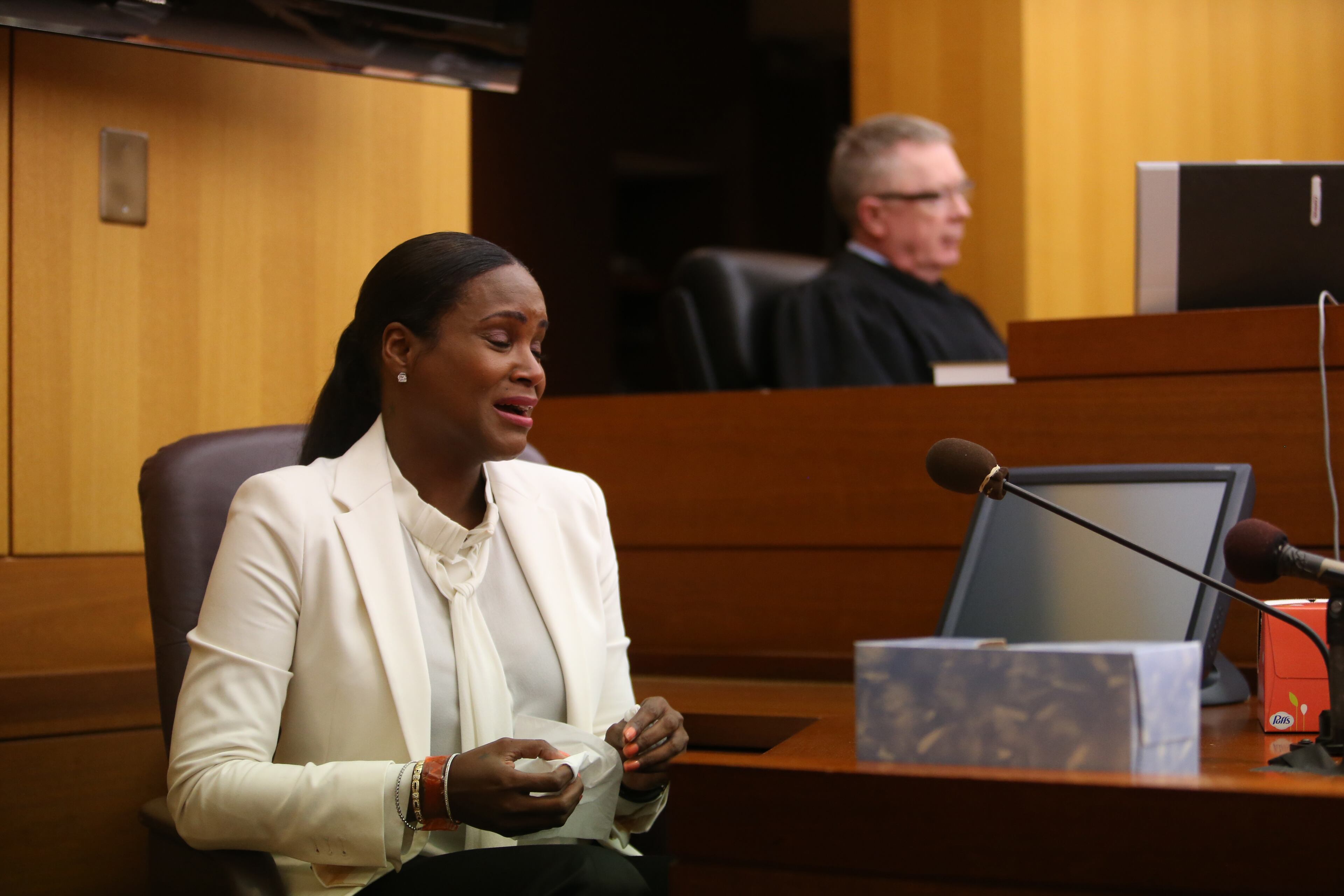 Tameka Raymond weeps in court Friday, Aug. 9, 2013.